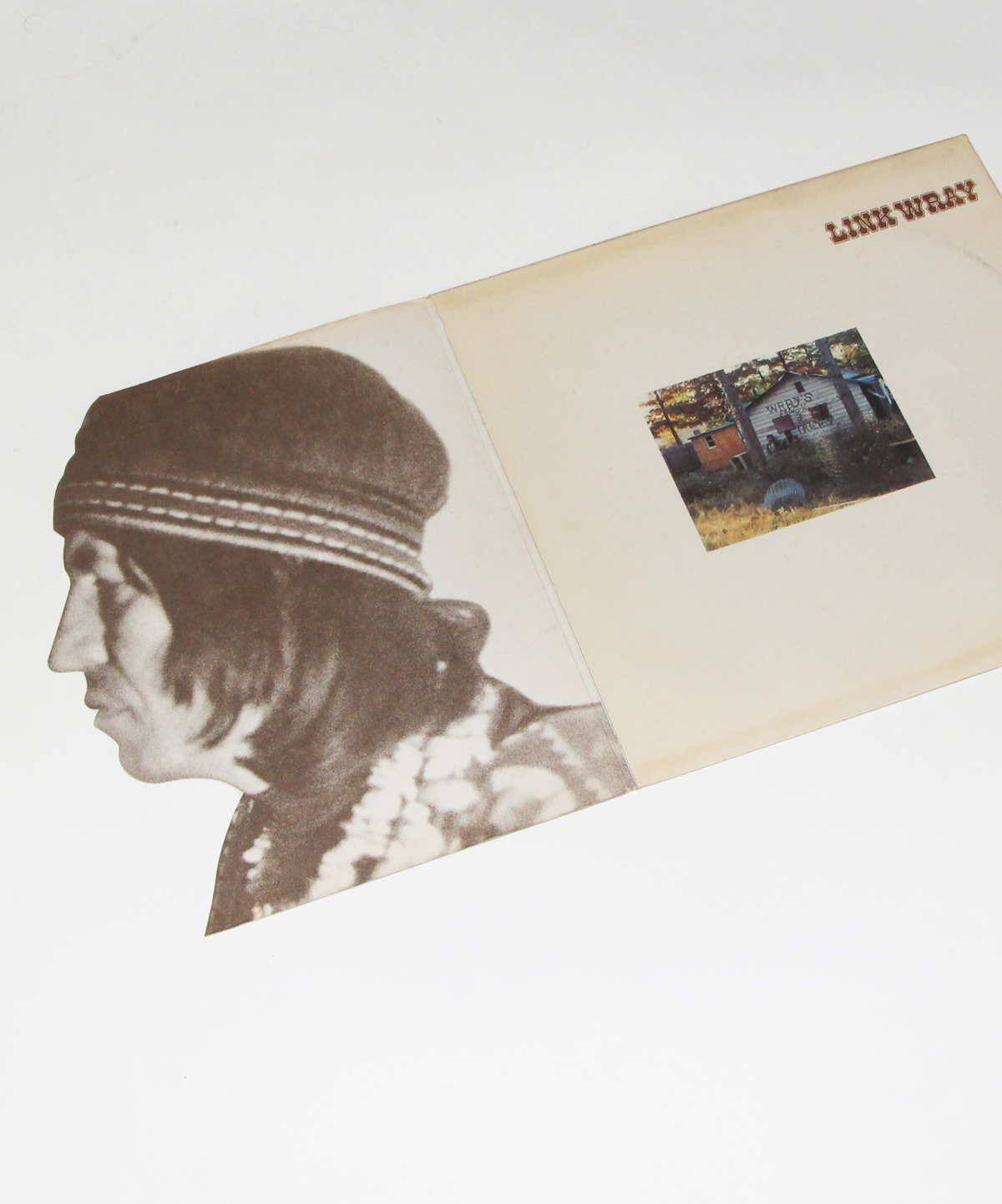 Link wray record cover opened with die cut flap revealing image