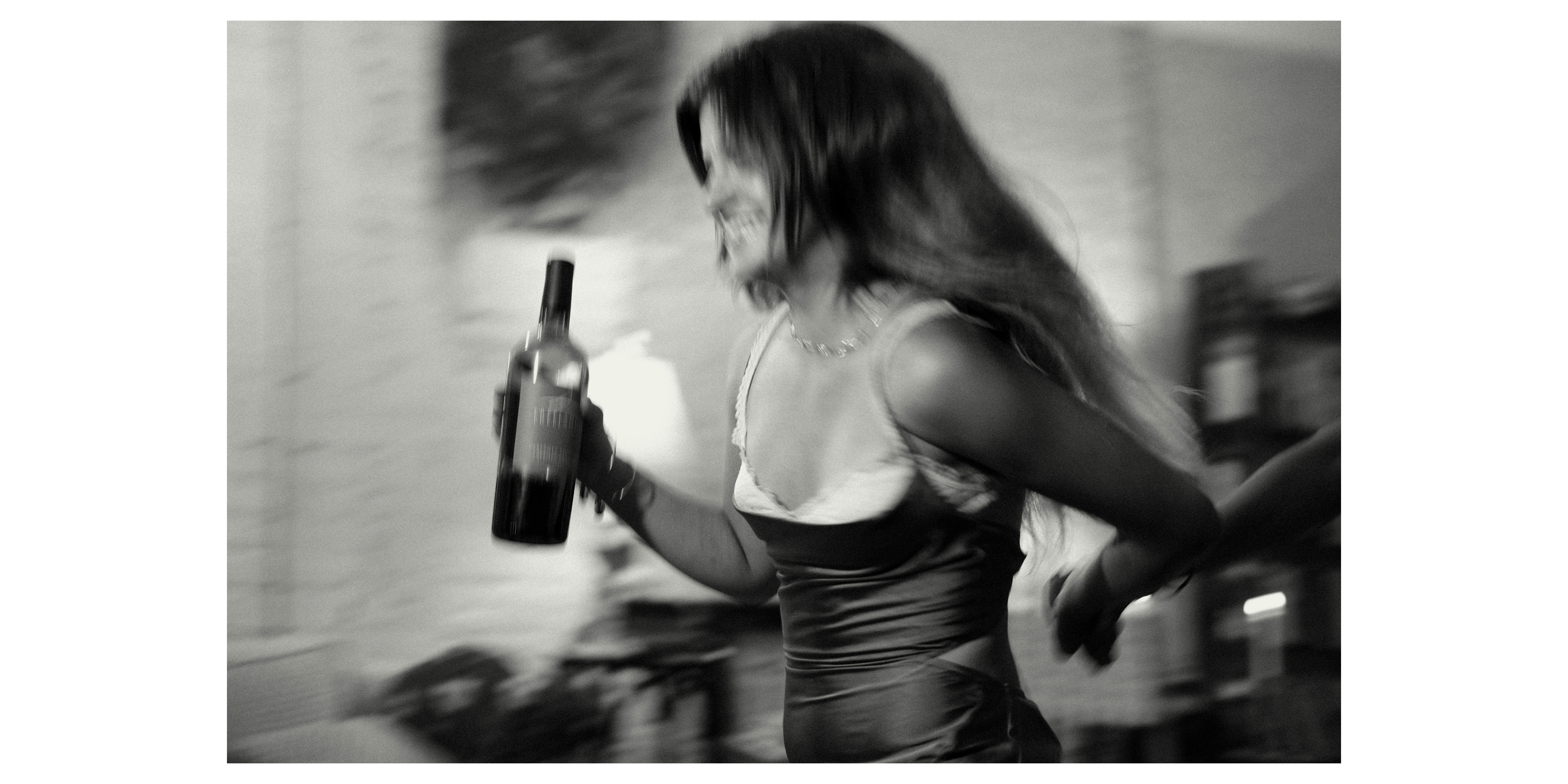 Running through the room with wine