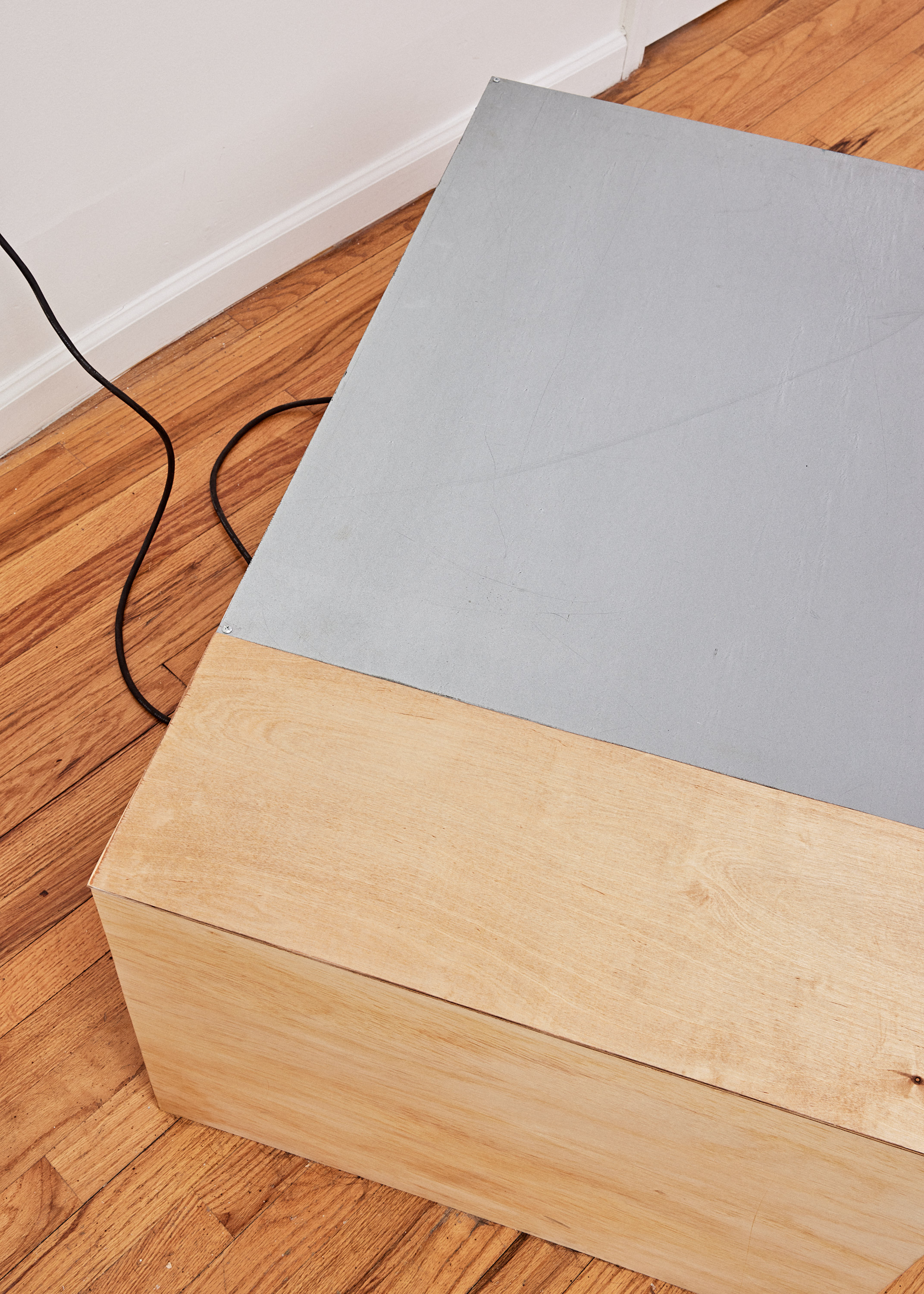 Untitled, 2022 Steel, plywood, electrical components, with sound piece on cassette tape. 18"x39"x24" 