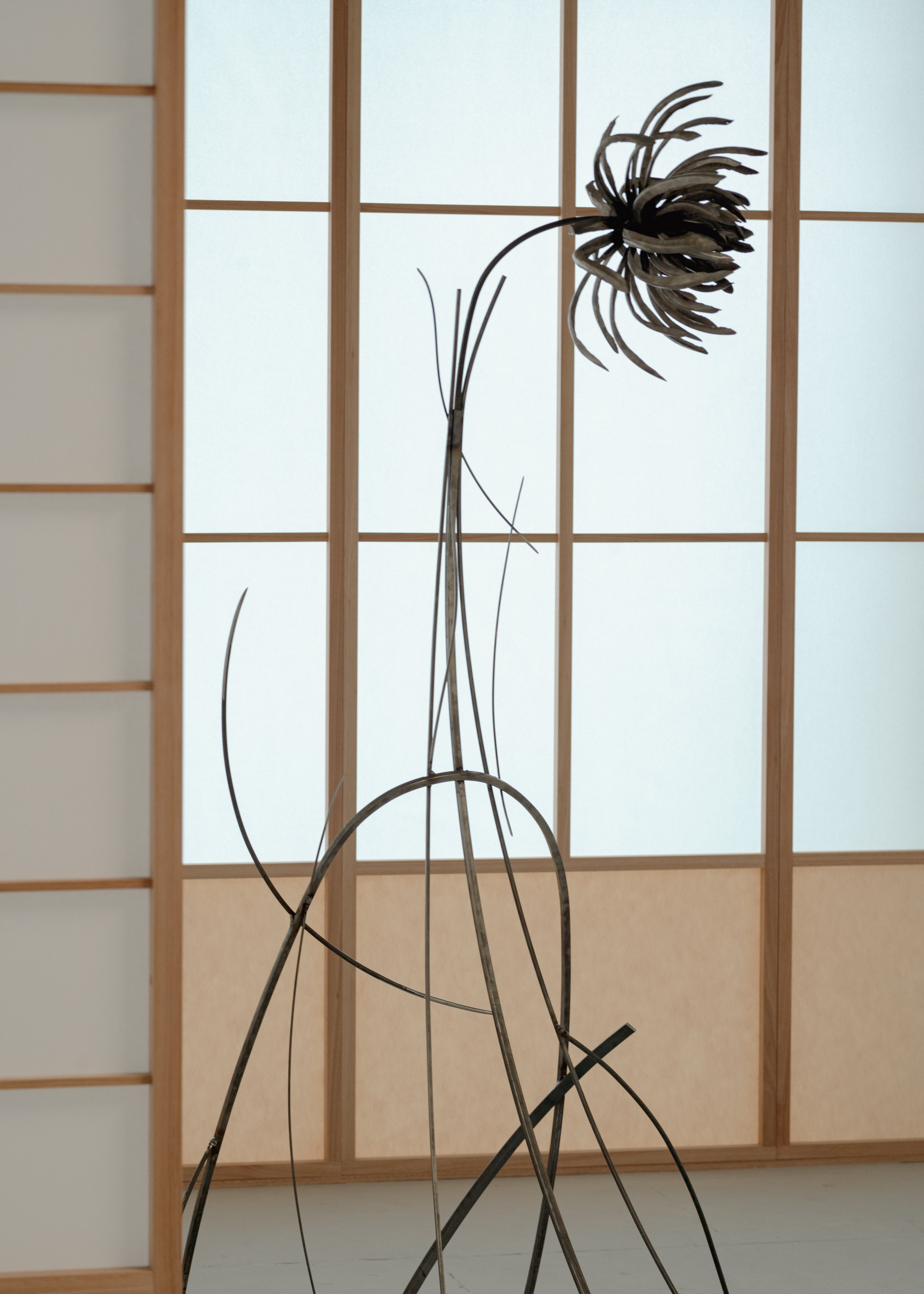 Bloom I, 2025. Steel, bronze, trinitite/atomsite glass from Trinity nuclear test site.