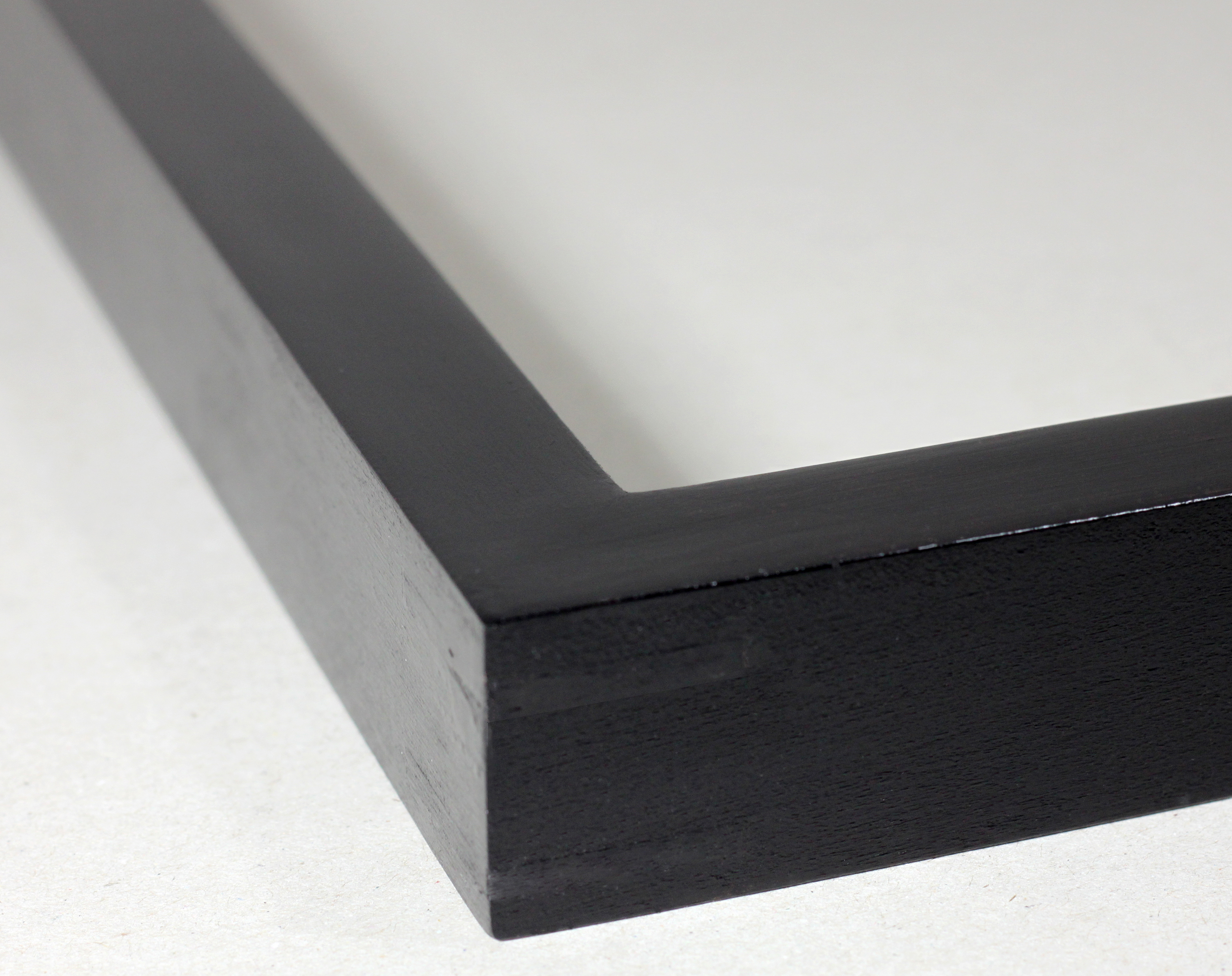 020-M-B28 with finish FB-2; Black casein on gesso (top) with semi-matte lacquer