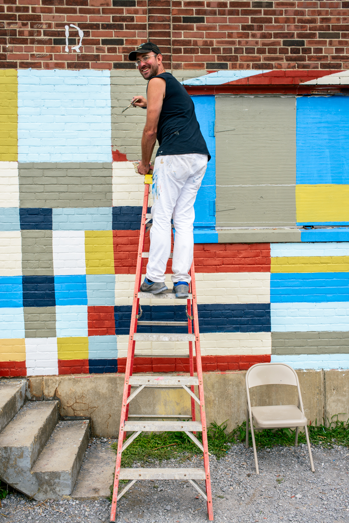 Community-painted mural, led by Clark Derbes with students from King Street Center. Photos by Daniel Cardon.