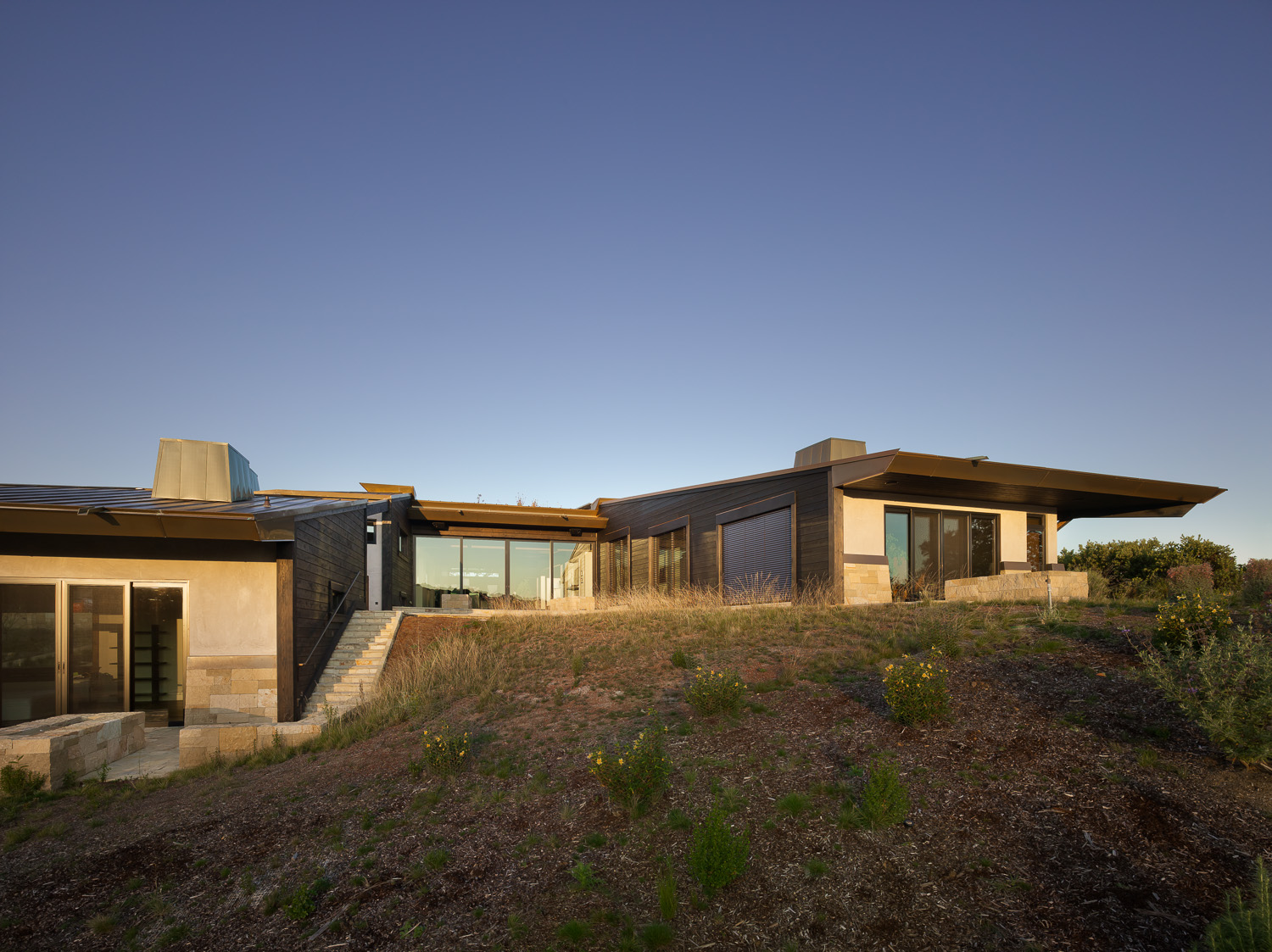 East elevation from native landscape below | Northern California Residence | PARABOLA Architecture