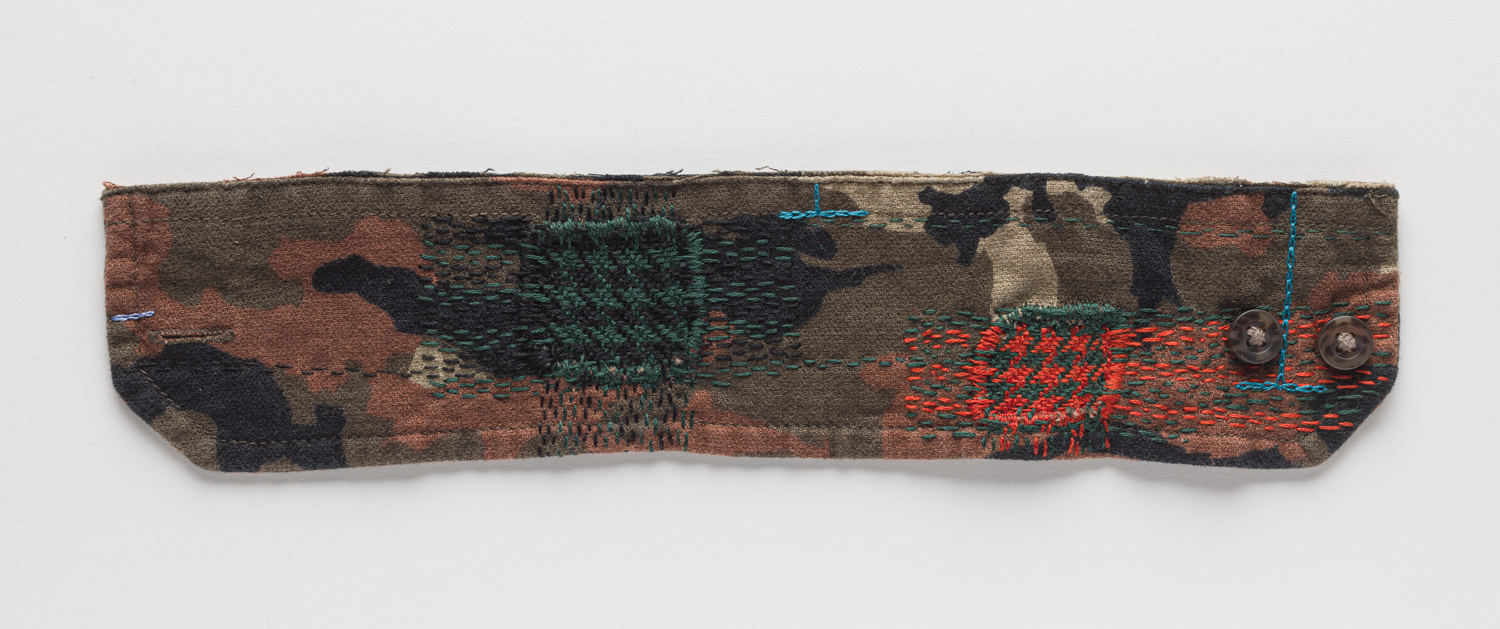 Cuff 13, 2025. Mending and embroidery in shirt cuff. Photography by Tim Thayer.