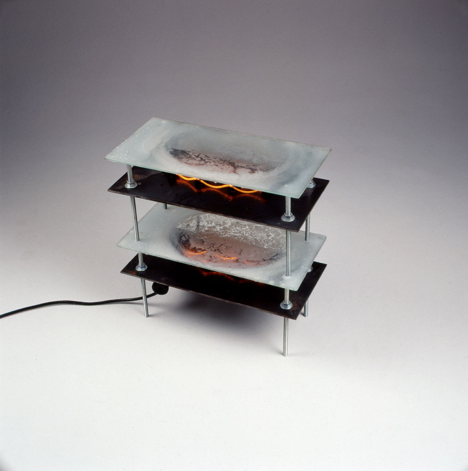 1992   I   untitled   I   iron,parafin, eletrical resistence and glass   I   41 x 40 x 20 cm