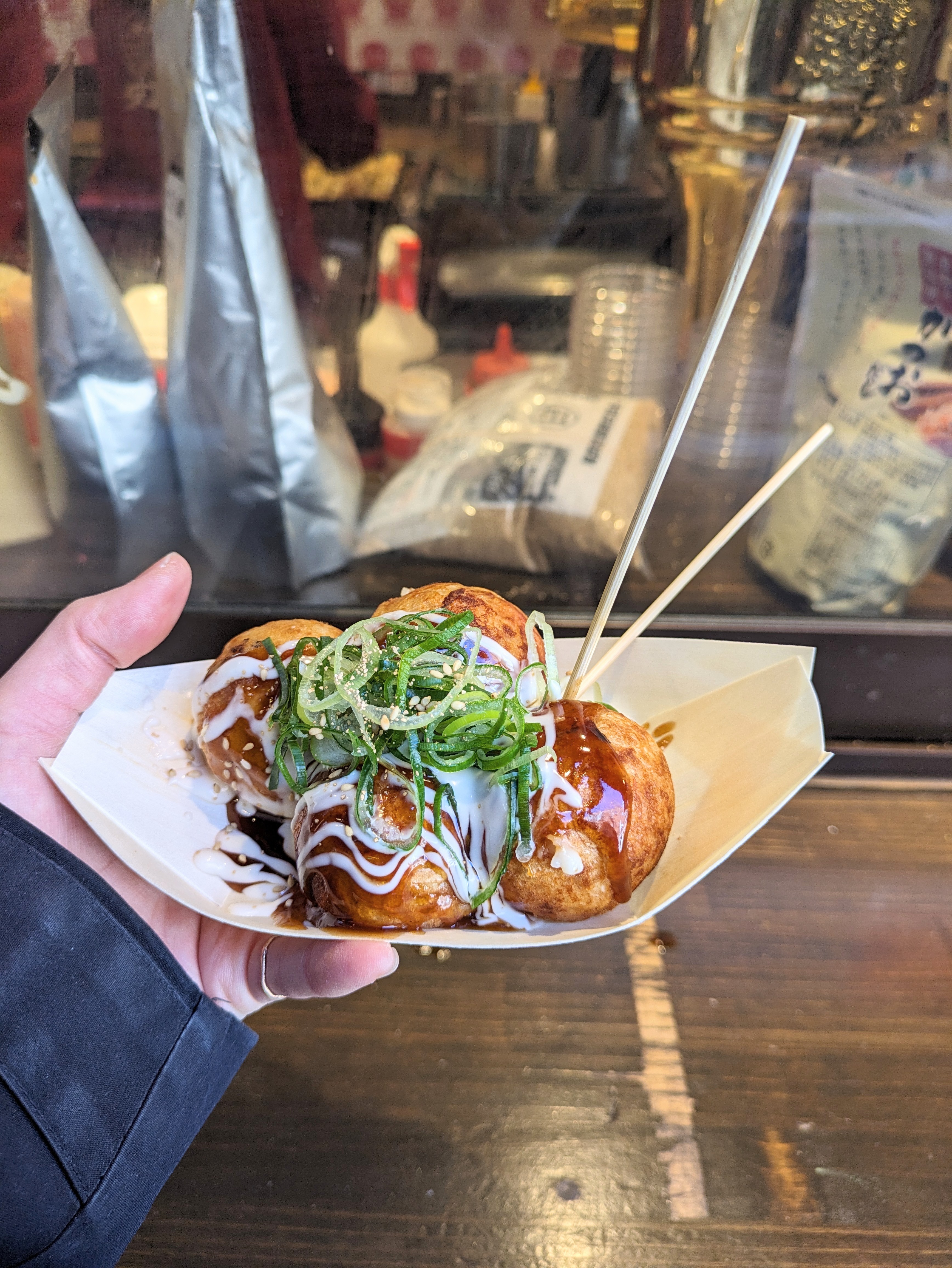 1. Eat some takoyaki at Nishiki Market—