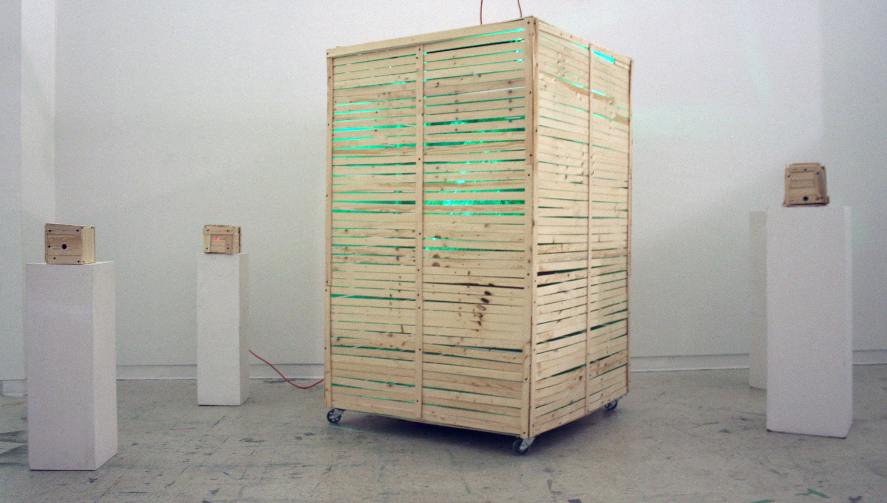 This Will Never Make It Across The Sea,  sizes variable, 4 x 4 x 4 inches - 4 x 4 x 7 feet, LEDs, rock slides of Franklinite, mirrors and wood