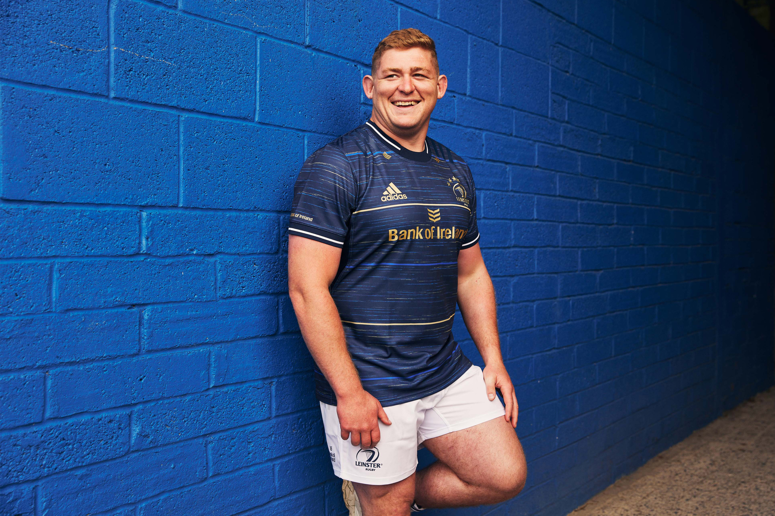 Portrait of Tadhg Furlong in Leinster kit, photographed by Dublin based lifestyle, fashion, and advertising photographer Alex Sheridan for Adidas, capturing authentic energy and real moments