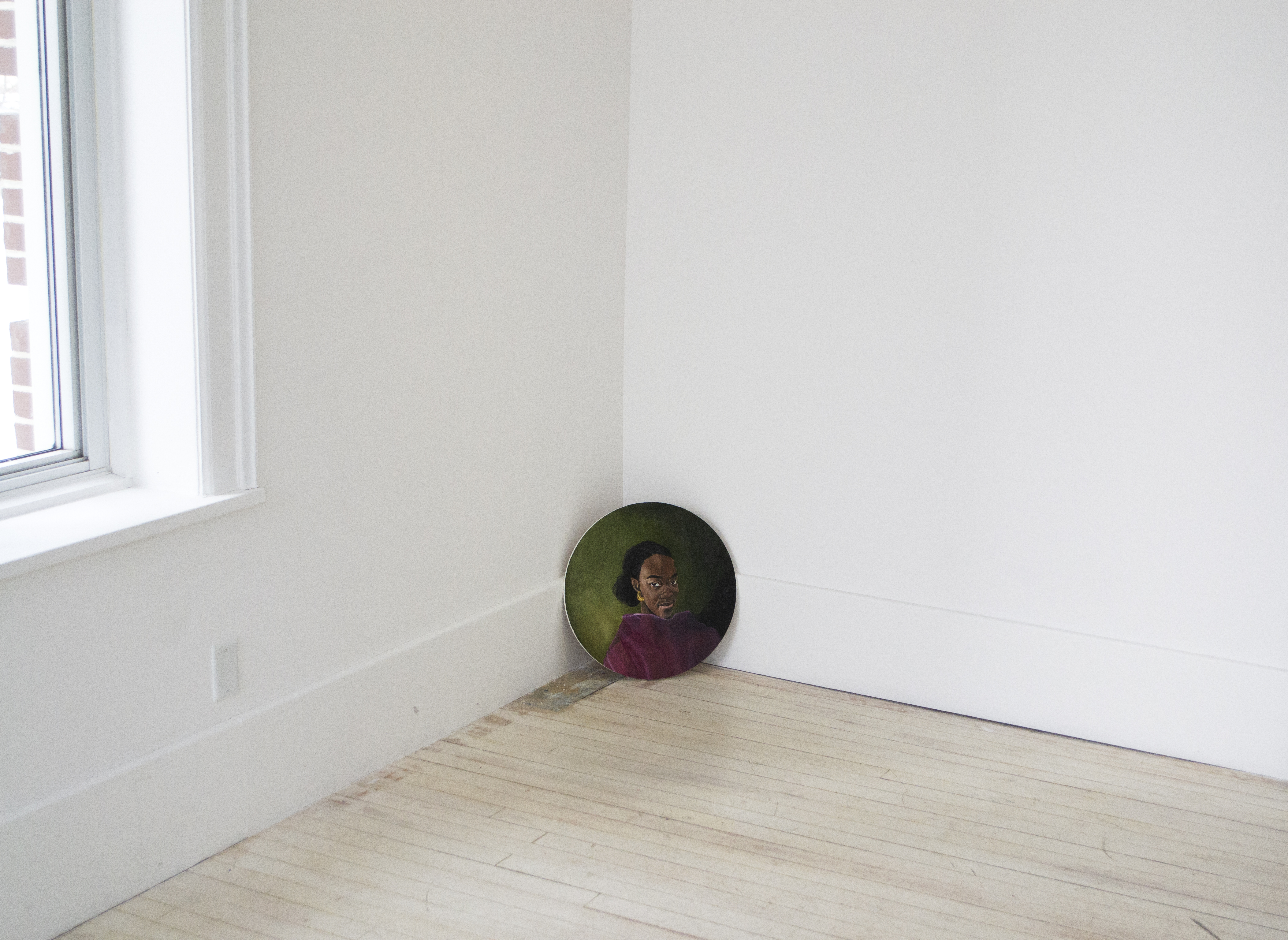 Family Portrait Series: Ekene as Akum, 2019, oil on birchwood, 15” diameter