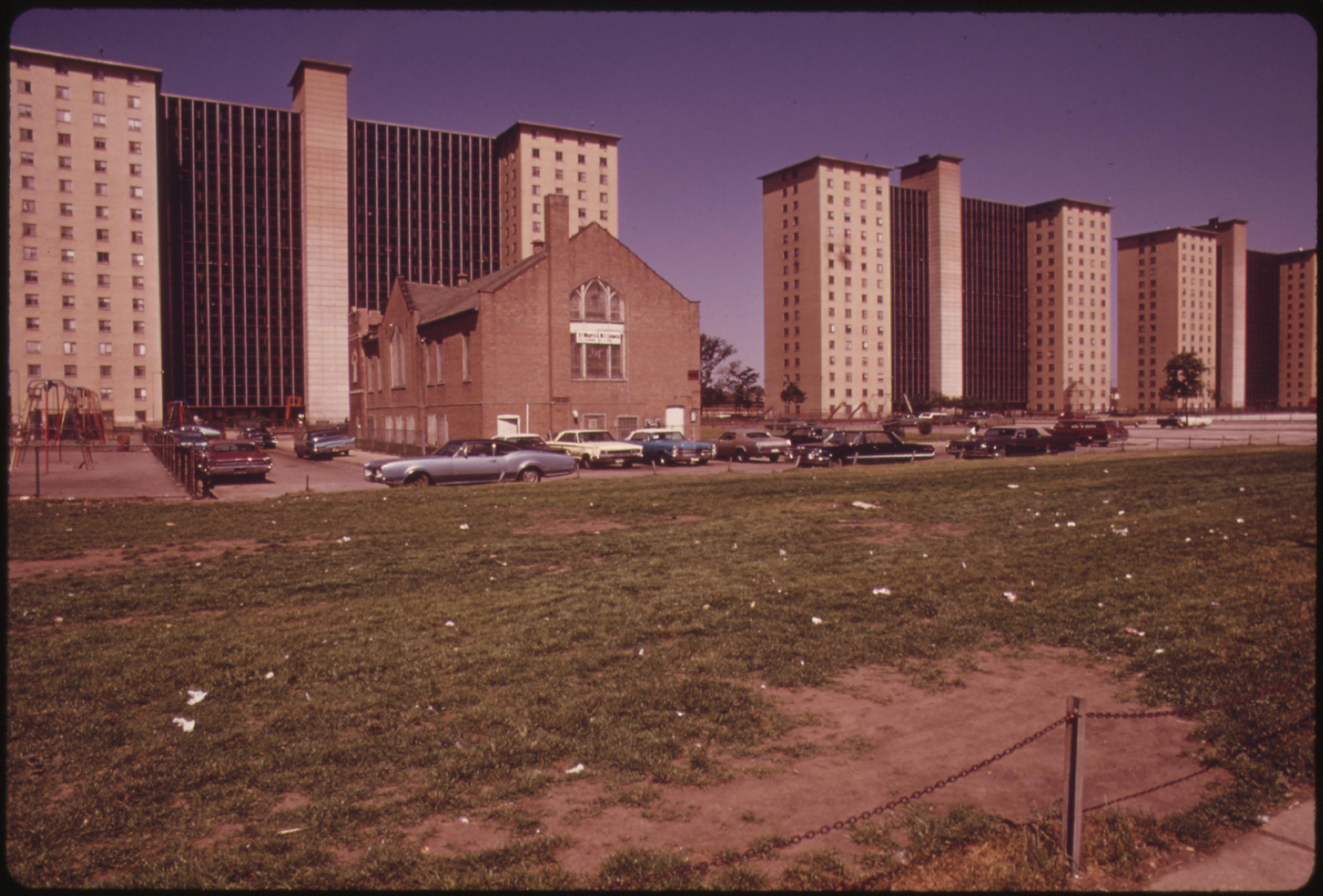 Robert Taylor Homes, a low income highrise apartment complex inhabited by Blacks on Chicago’s South Side. There are 28 buildings with 4,312 apartment housing 25,220 persons. A goal of many residents is to find a job that pays enough for them to reach middle class status and move. From 1960 to 1970 the percentage of Chicago Blacks with an income of $7,000 or more jumped from 26 to 58 percent. In 1970 Blacks had a median income of $7,883, but it was $3,603 less than that for whites, June 1973.