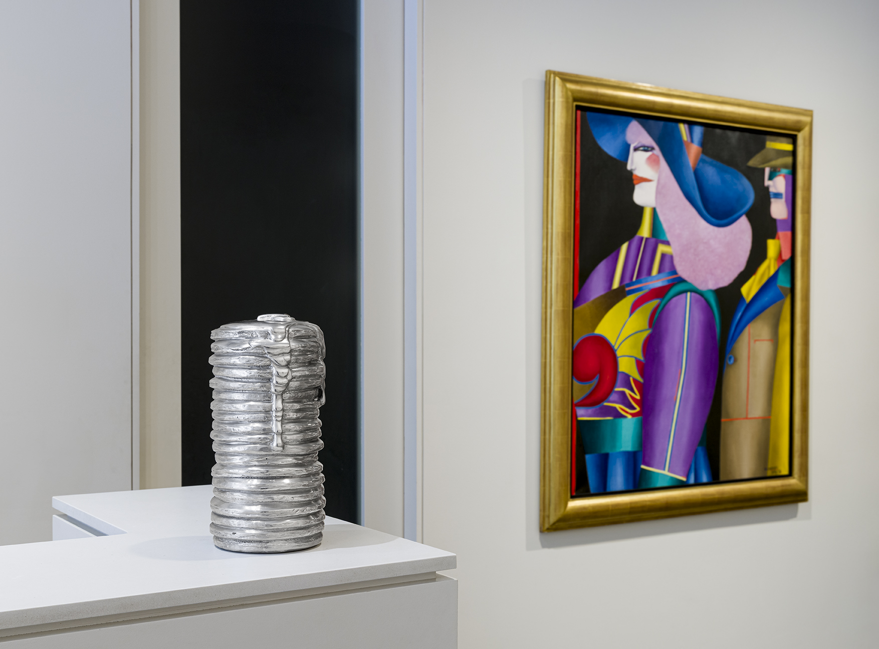 Left: Adam Brent, Pancakes, 2021–2022. Carved aluminum, 12 x 6 x 6 inches. Right: Richard Lindner, The Yellow Tie, 1974–75. Oil on canvas, 50 3/8 x 41 3/4 inches. Photo by Etienne Frossard.