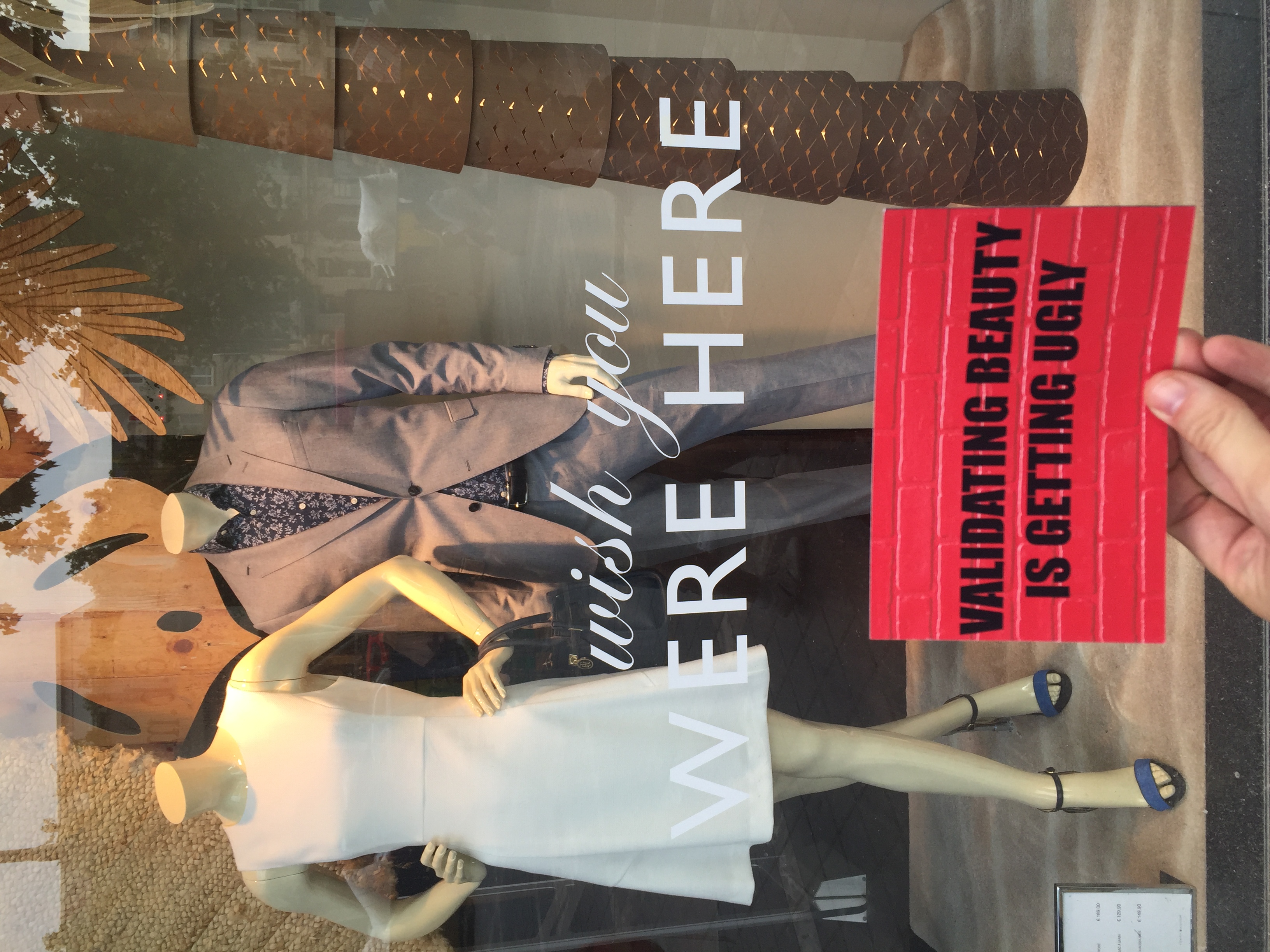 I thought this card went totally perfectly at this window display along the poshest shopping street in Brussels. The window text is just too apt. 