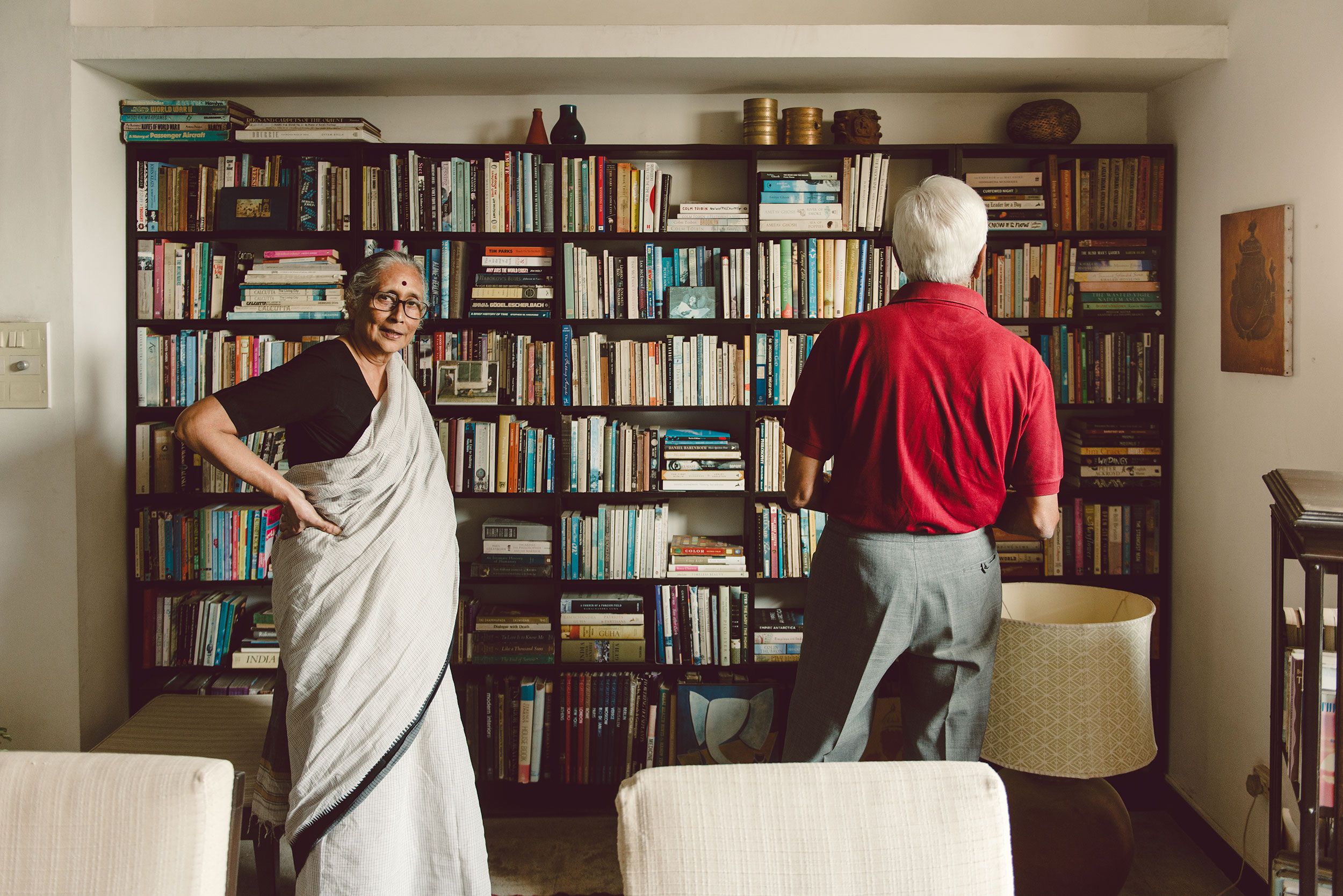 gopi and gita, living room library. always ready for a stimulating conversation about music, books and life. they gave me my first vinyl collection and got me started with it.  