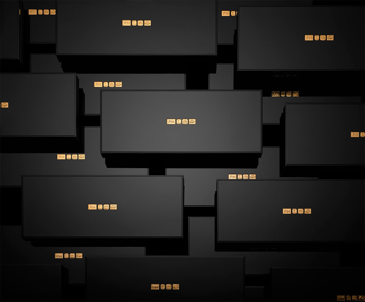 KMA stylist Rachel Haas designs set for photo of many black and gold boxes for Pat McGrath 