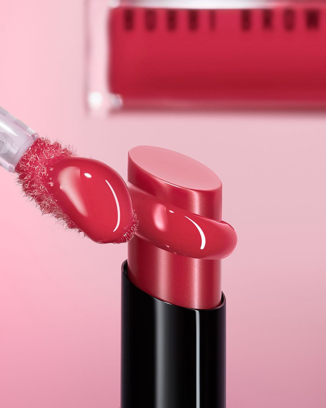 KMA stylist Rachel Haas designs set for photograph of smeared lipstick with its tube for Bobbi Brown against white background