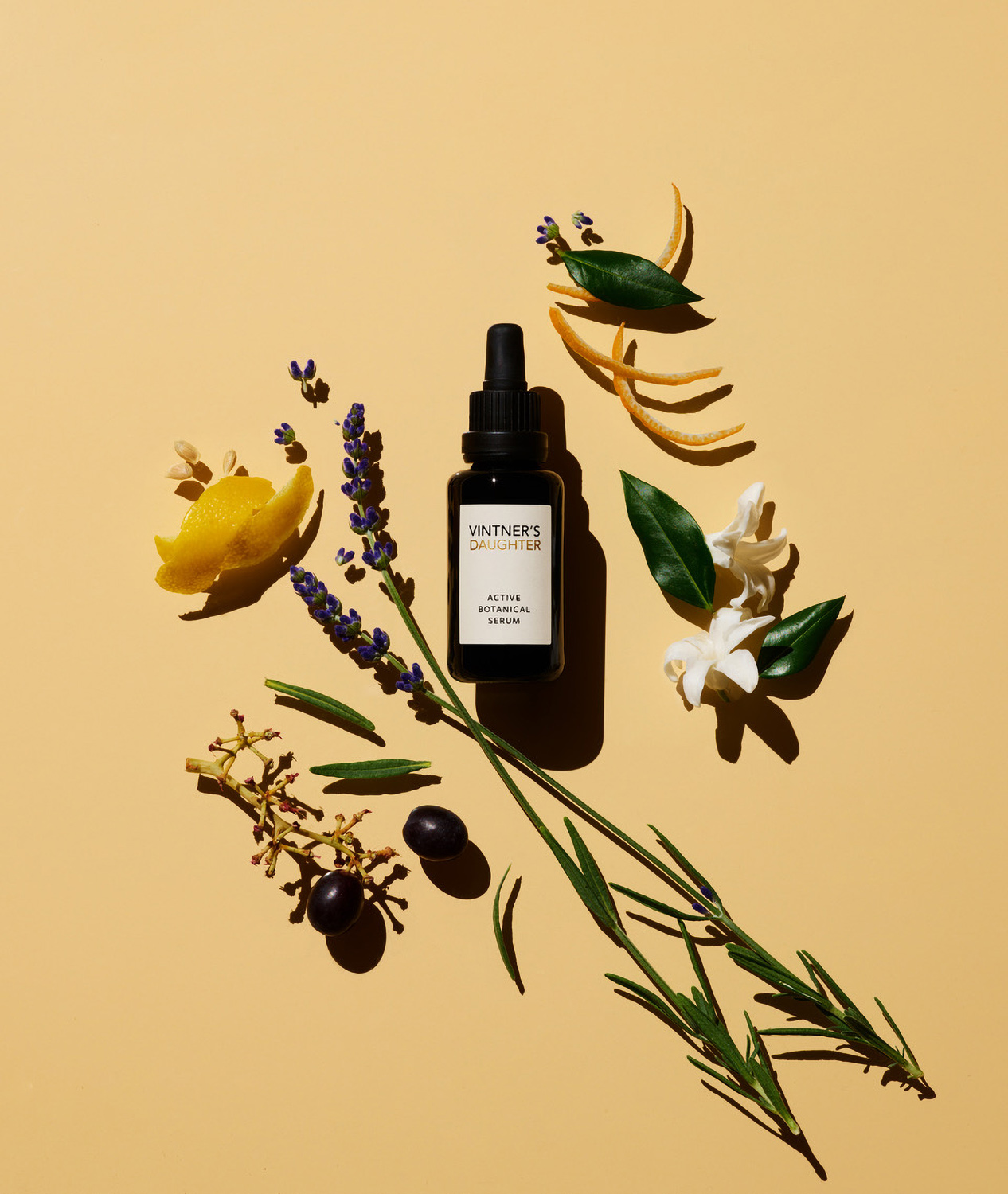 KMA stylist Sara Wacksman designs set for photo of Vintner's Daughter serum bottle surrounded by flowers for CR Fashion Book 