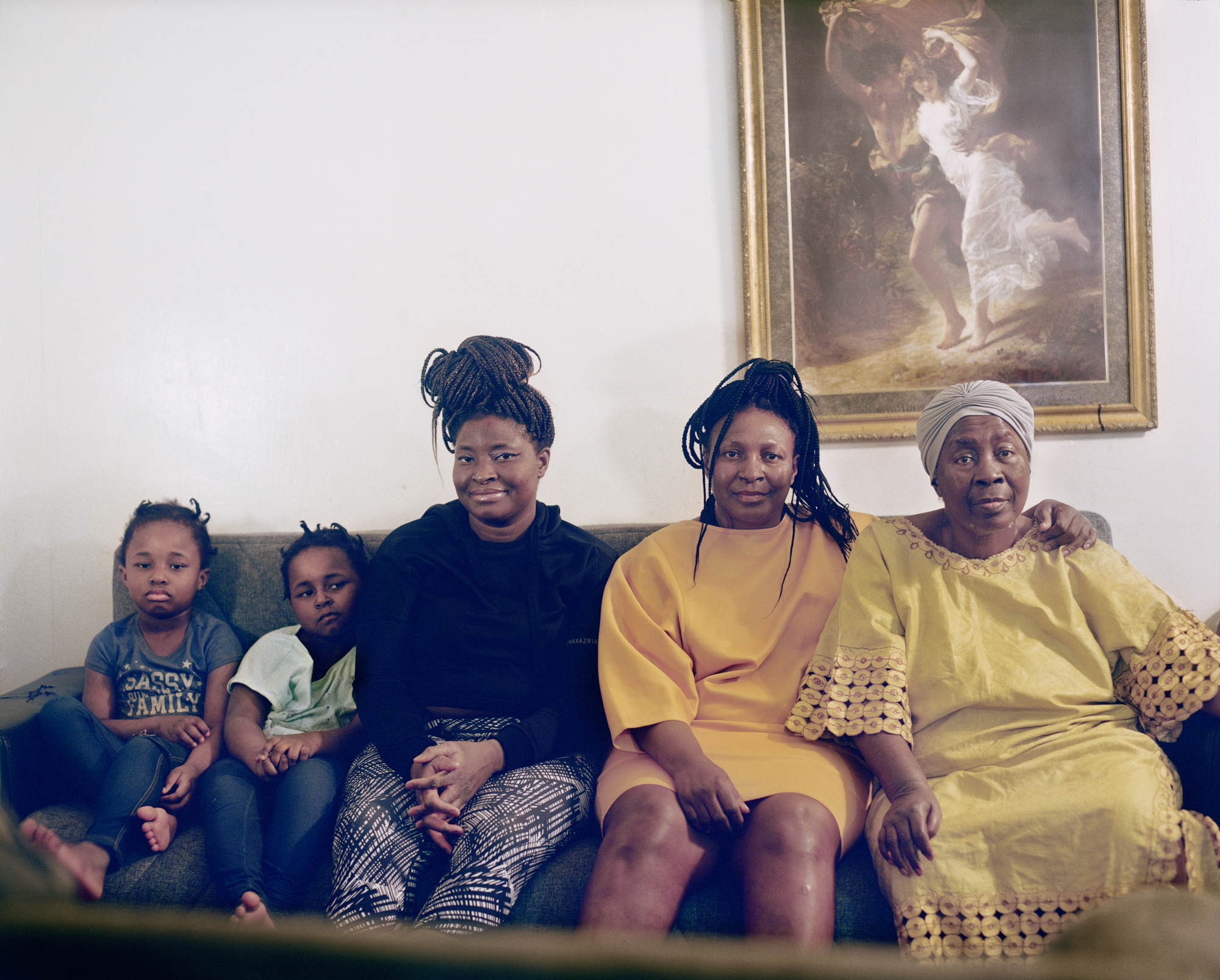Four generations of women (from left to right) Jolie (4), Bella (4) Hawa, Fatmata, and Memuna (Granny), originally from Sierra Leone, all live under one roof supporting one another through the challenges brought on from the coronavirus pandemic.