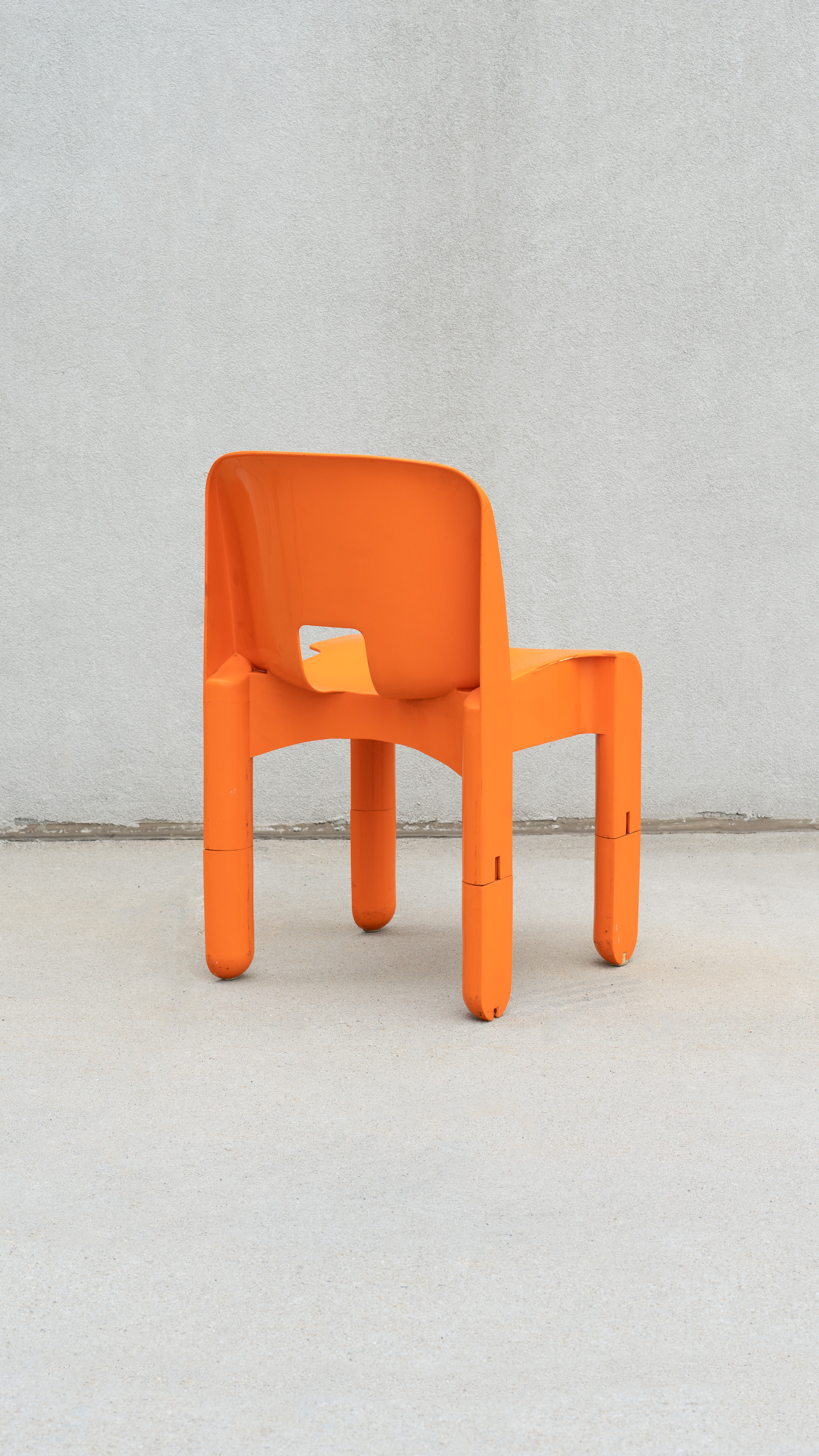 SWEETERFAT KARTELL UNIVERSALE CHAIR PRE PRODUCTION ORANGE BLACK WHITE PLASTIC SPACE AGE CHAIR DESIGNED BY JOE COLOMBO 