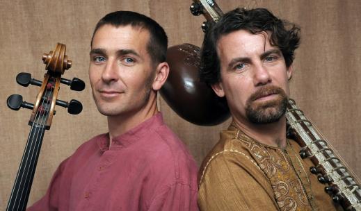 A two-person headshot of, from left to right, Peter Jacobson and Paul Livingston with their instruments.