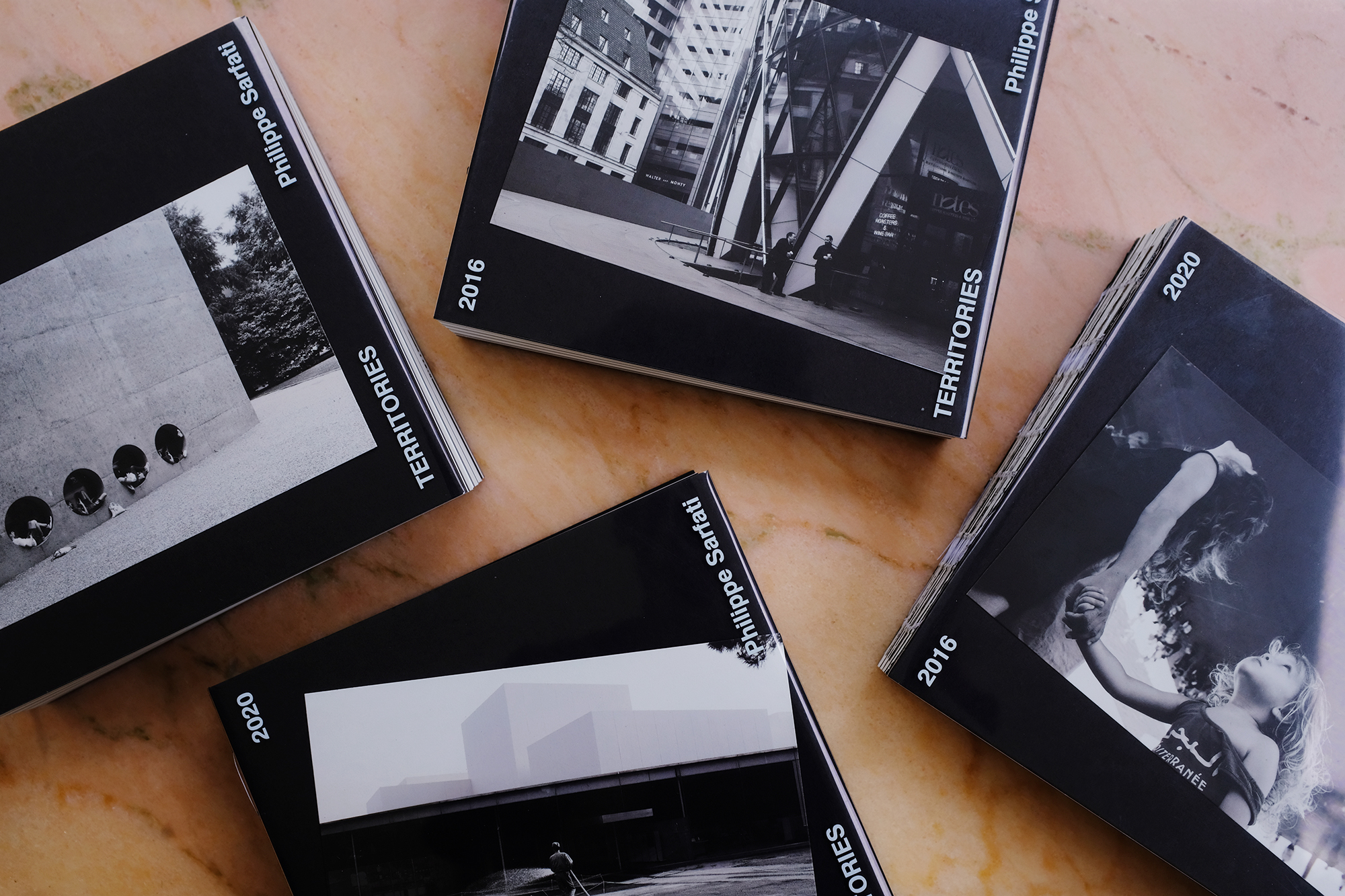 Philippe Sarfati-Territories-photography-photographer-street-documentary-architecture-black-and-white-book-design-arvinius-orfeus-kickstarter-cover-layout-white-page-pink-marble-multiple-postcards-flexible-cover