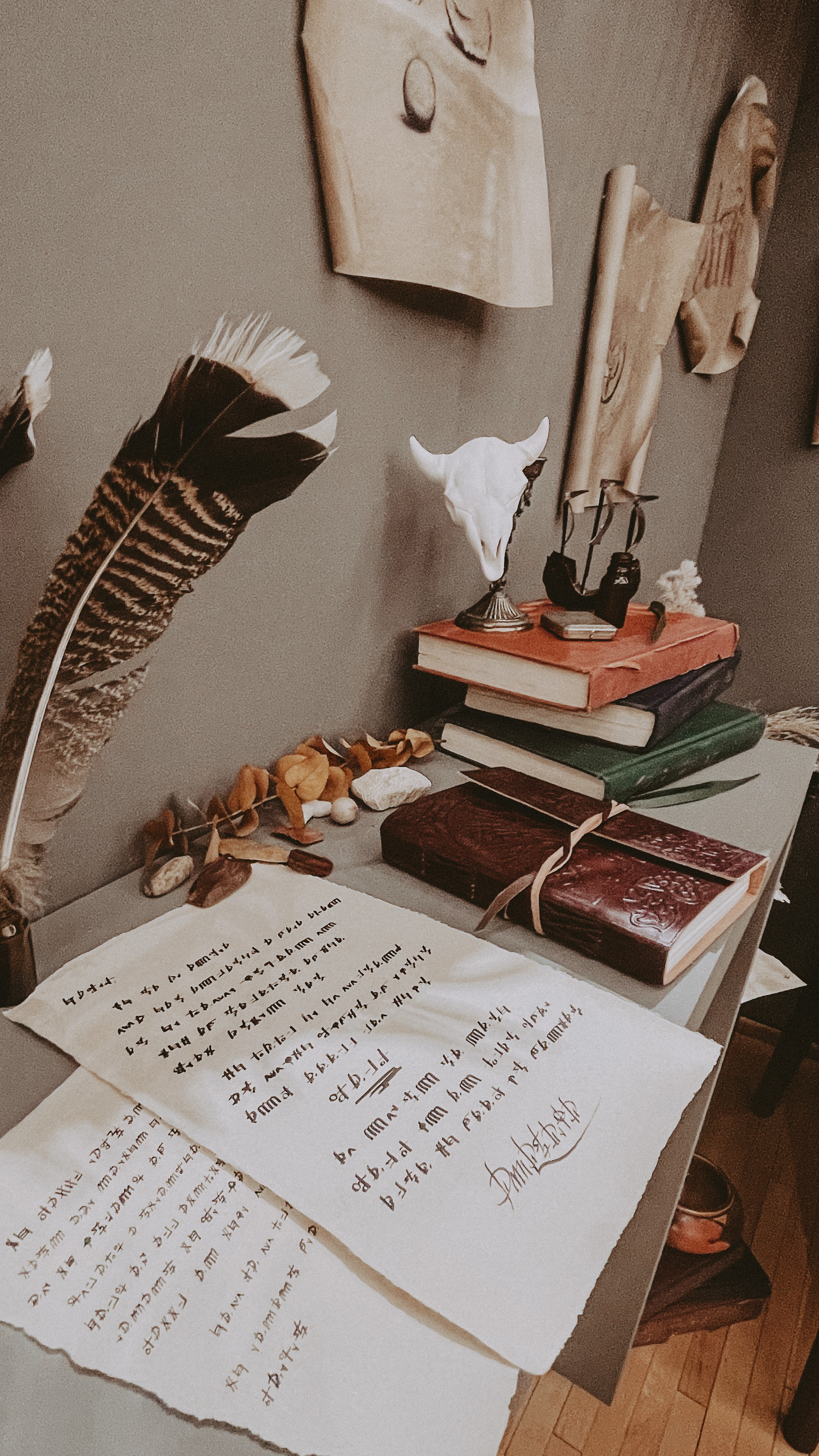 Through linguistic research and worldbuilding tactics, I developed a symbol-based written language similar to the story's time, 300 b.c. I based the letterforms on written language from Sumerian and Phoenician alphabets.