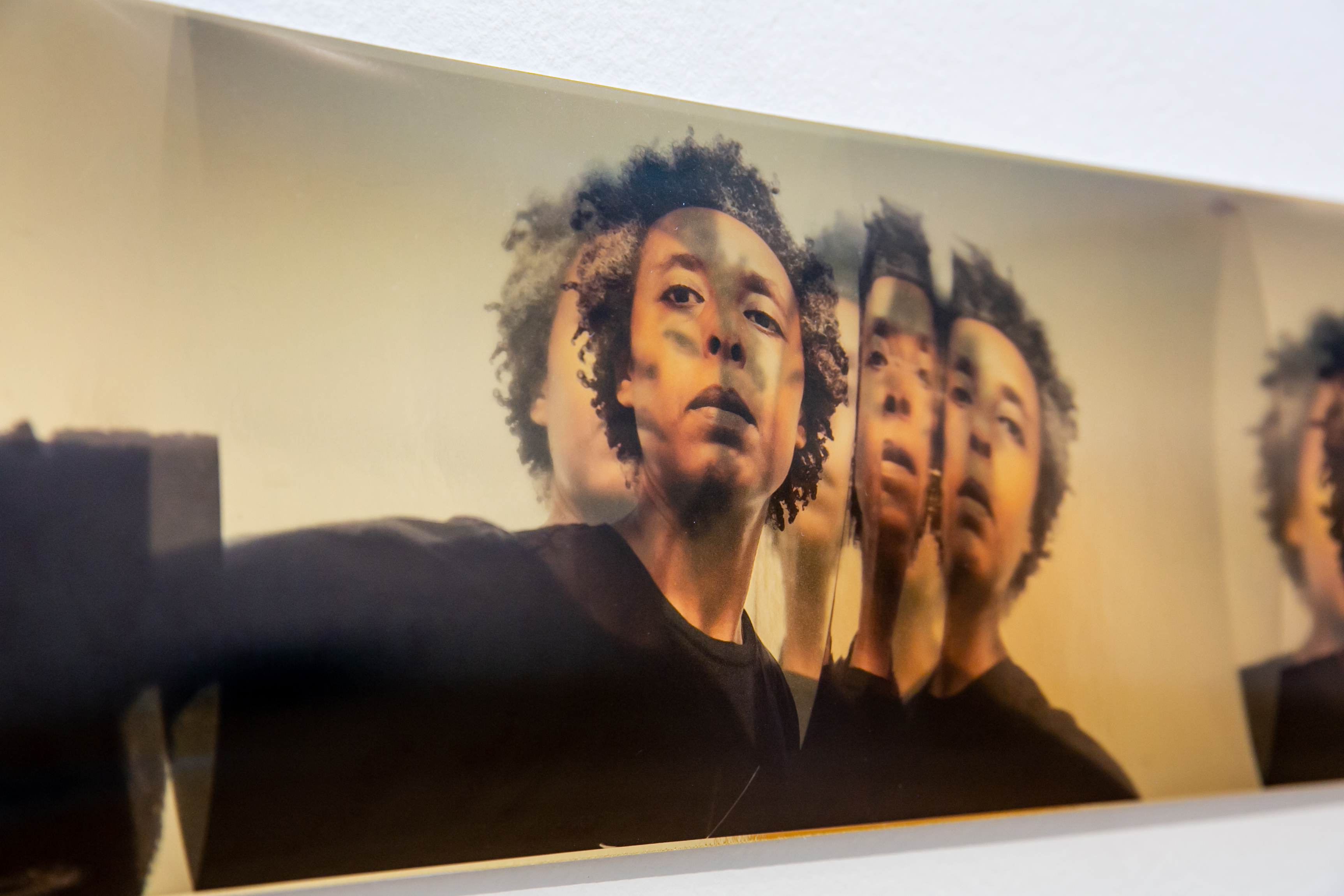 mutability studies 01, 02, 03 detail image, archival print on clear film, reflective cardboard, dressmaker-pins 2019 6.25 in. x 108 in. Photo credit: Jeanette Nevarez