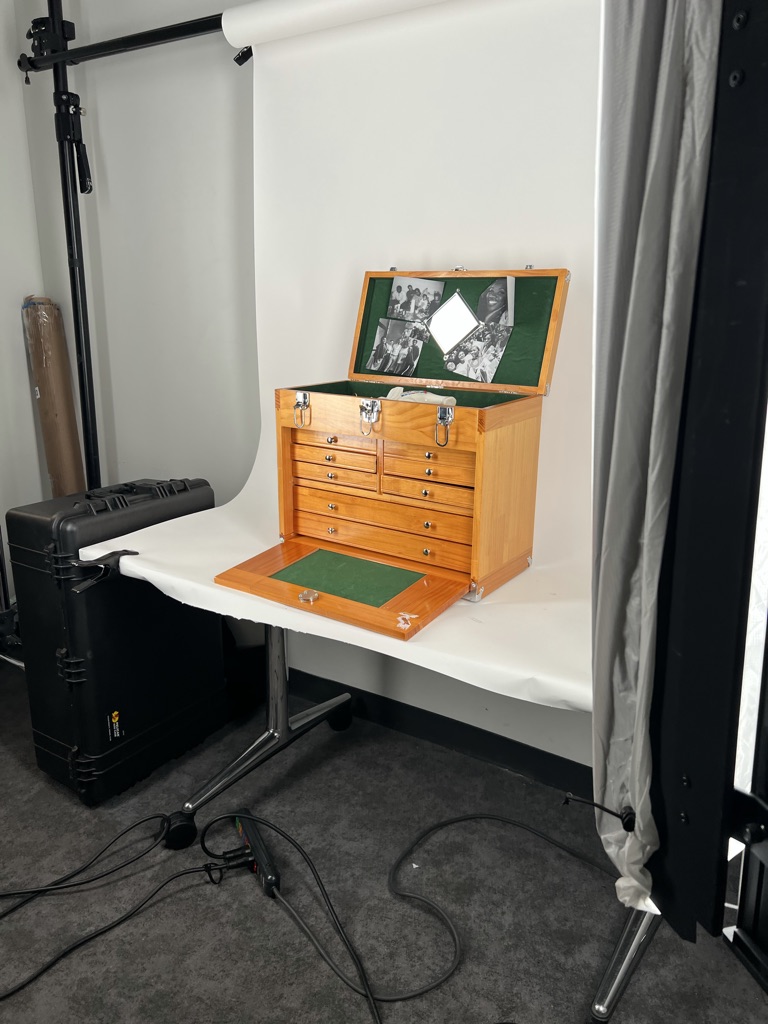 Chest with bottom compartment opened