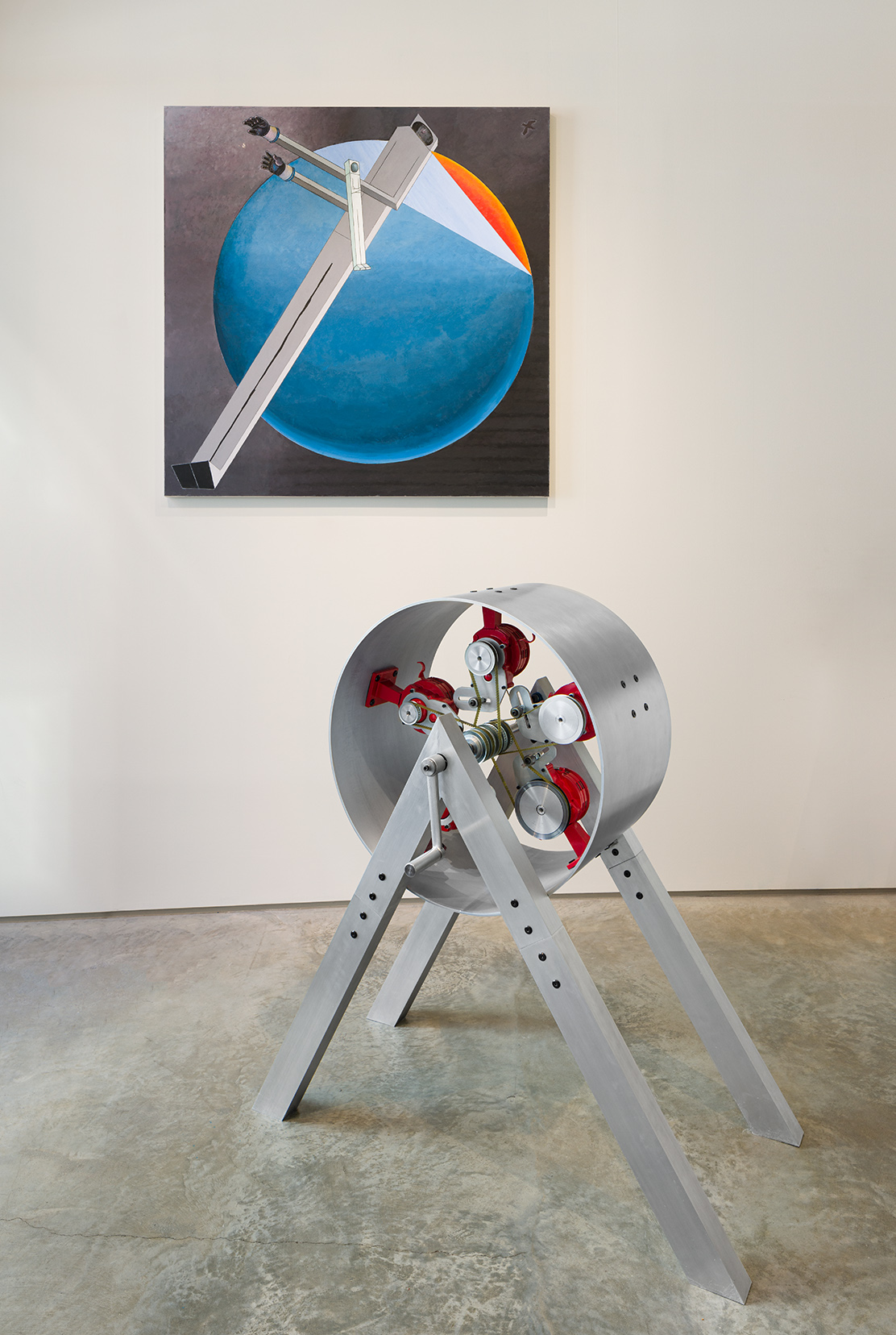 Front: Aura Satz, "The Wail That Was Warning," 2018. 5 daisy-chained sirens sound sculpture, 44 x 41 1/2 x 21 inches; Mernet Larsen, "Astronaut: Sunset (after El Lissitzky)," 2020. Acrylic and mixed media on canvas, 49 1/2 x 49 inches. Photo by Etienne Frossard.