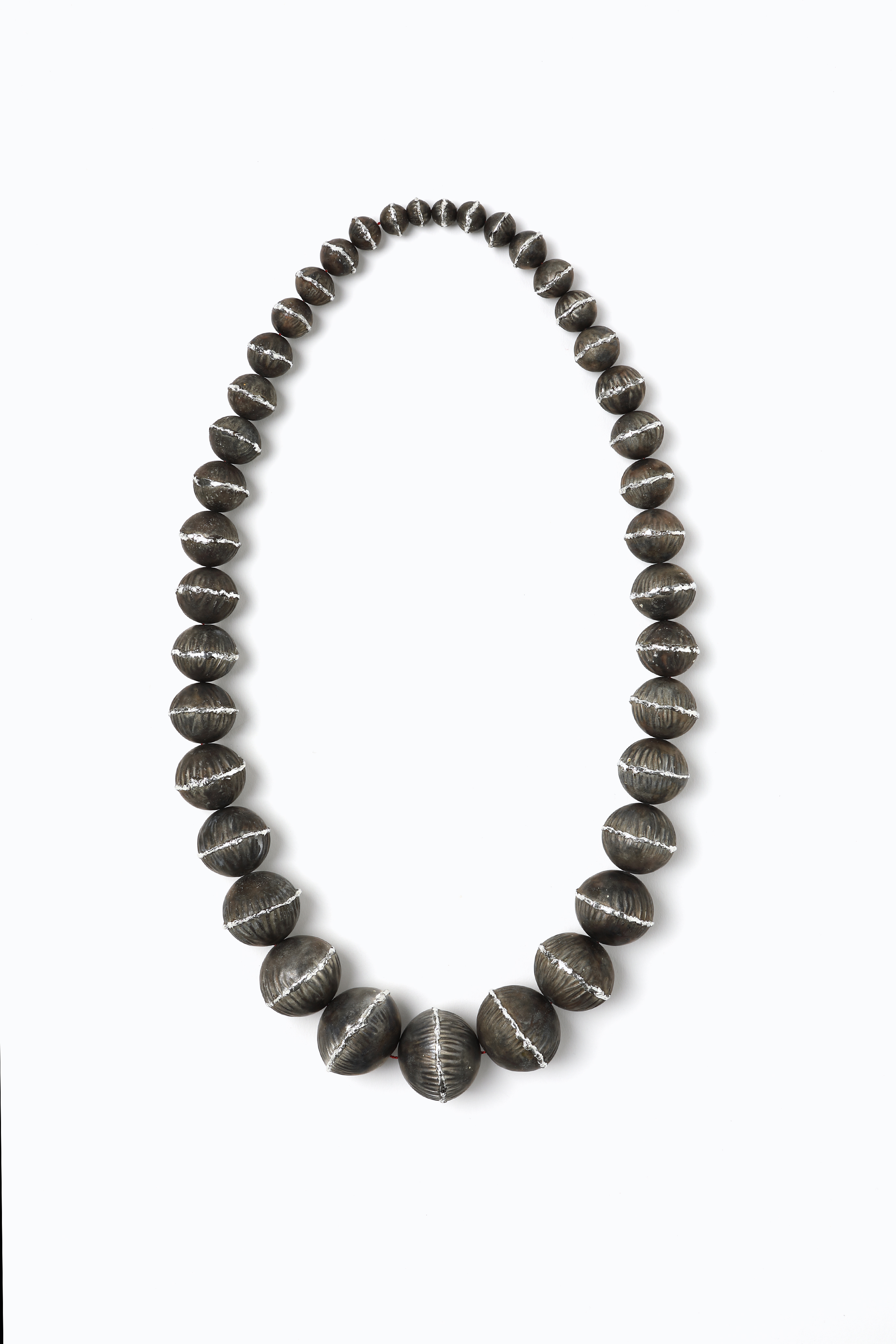 SnO | 2021 | necklace | tin (oxidised), thread
