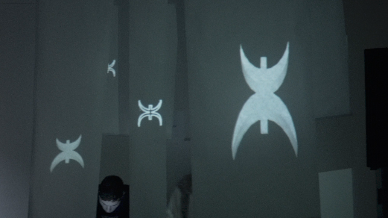 Projection mapping and reactive visuals for EXILES showcase 