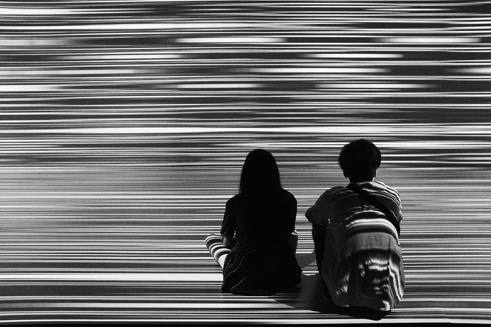 Philippe-Sarfati-early-work-photography-photographer-street-documentary-black-and-white-21-design-sight-tokyo-japan-exhibition-blur-projection-couple-inside-shapes-lines-speed