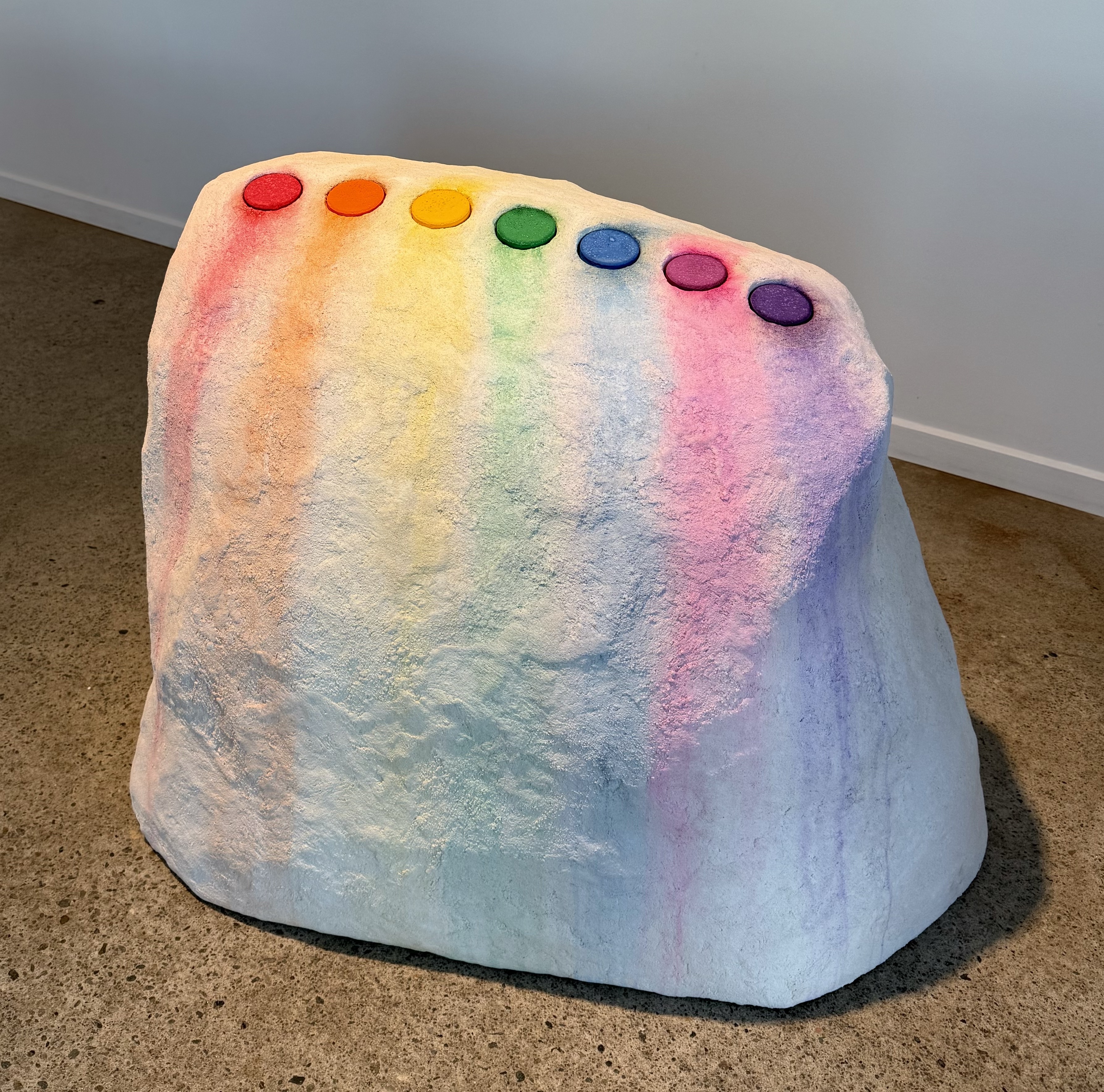 Jess Perlitz, Rain Rainbow, 2024, Concrete gypsum, paint cakes and rain, 27.5 x 39 x 24 in.