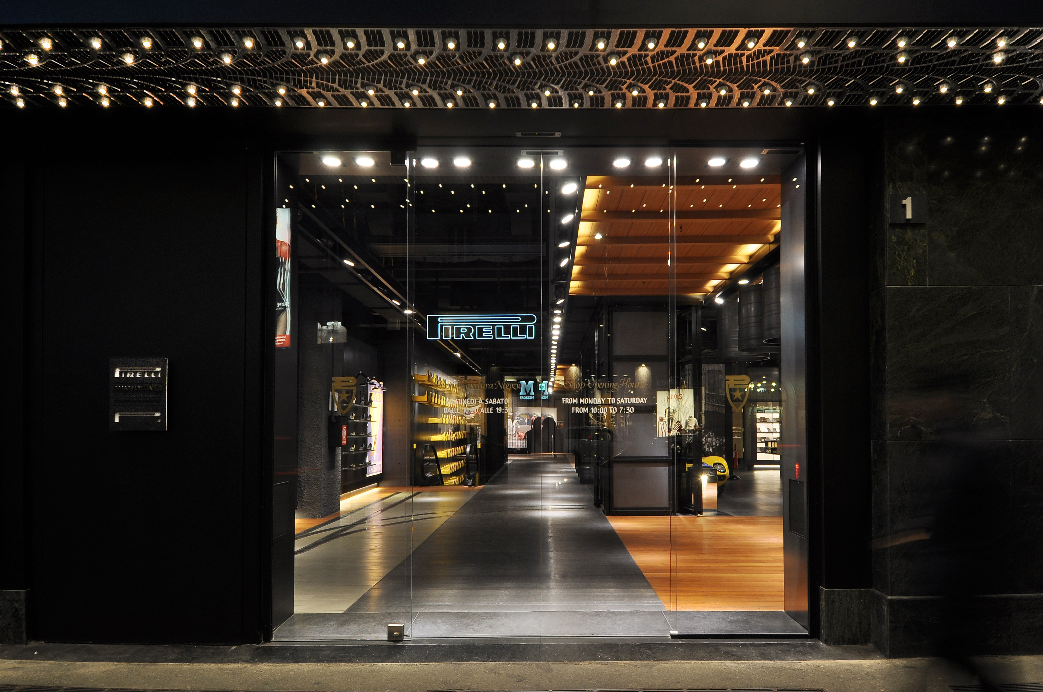 Pirelli PZero &ndash; Milan Store. Infographic and interior graphics project for the 1,000 sqm Pirelli PZero store in Milan. Developed the external entrance signage and customized graphic artworks for interior elements, including rubber lamps, lighting fixtures, special project displays, exhibitions, and collection display boards. Project designed in Change design