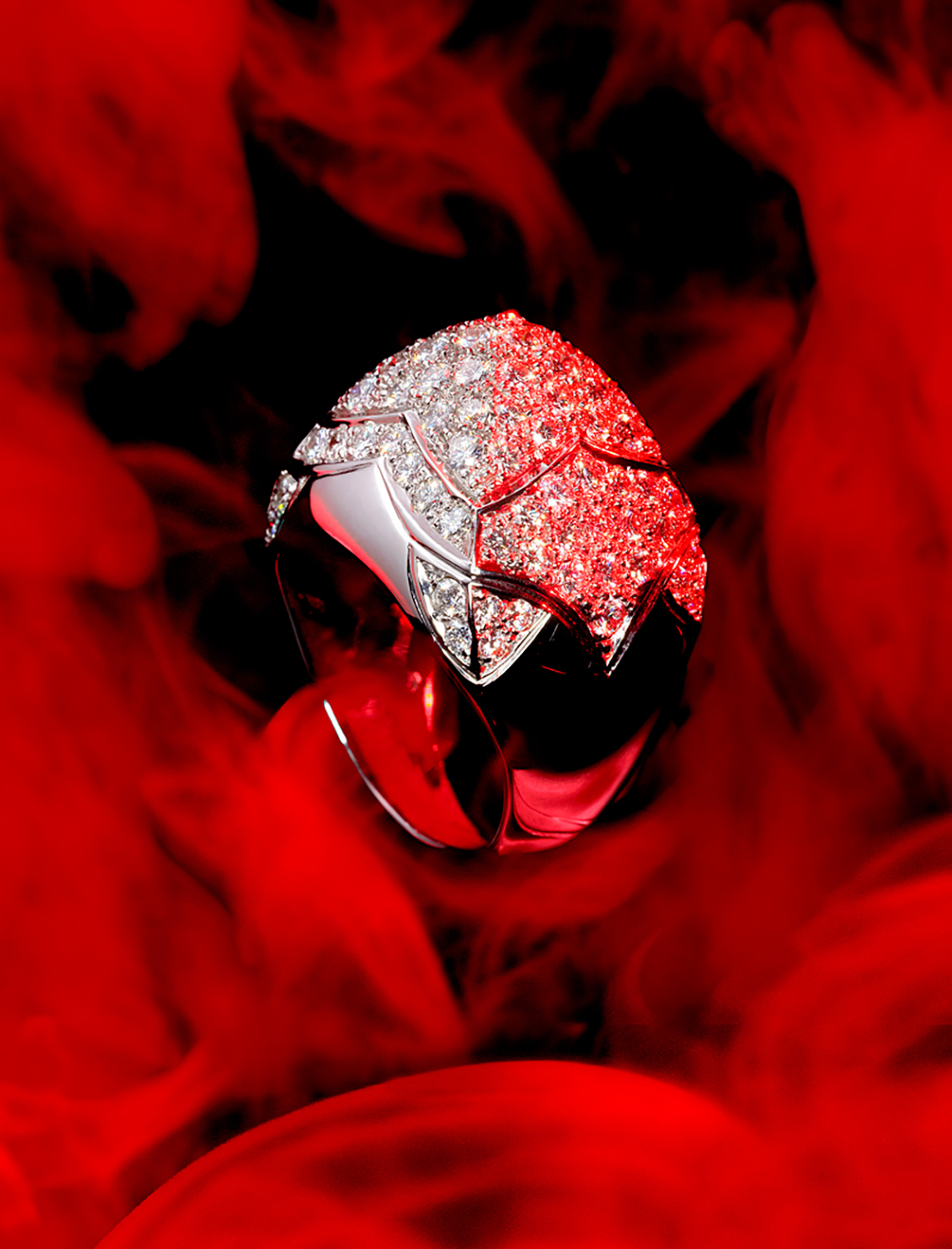 KMA photographer Isabelle Bonjean photographs diamond ring surrounded by red smoke for Figaro