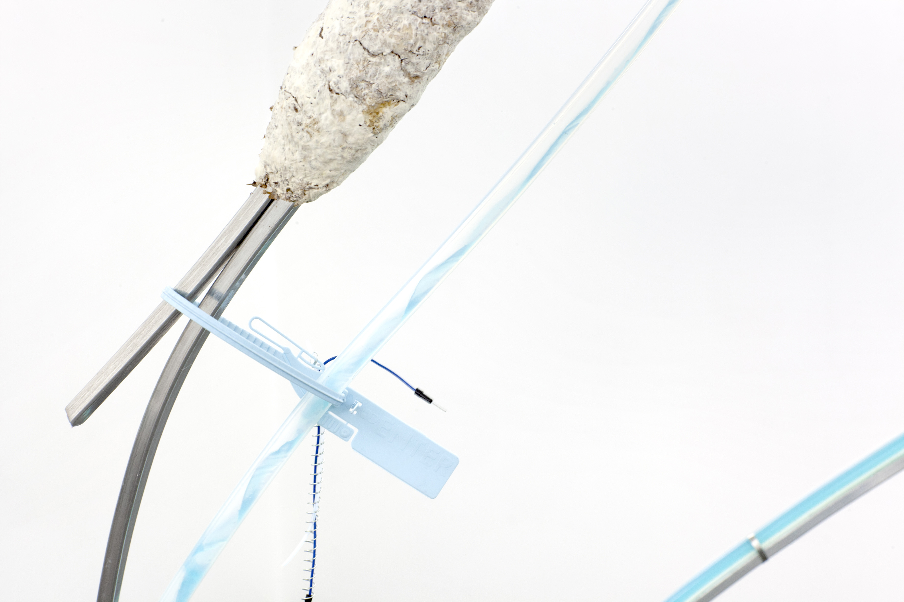 Chemical Vocabularies, 2021, [various dimensions], Protean Fluid, Gossamer Fog Gallery, London  Mycelium, copper sulphate, bisque fired ceramic growing crystals, peristaltic pump, aluminium  armature wire, steel, silicone tube, various cable ties and electrical wire 