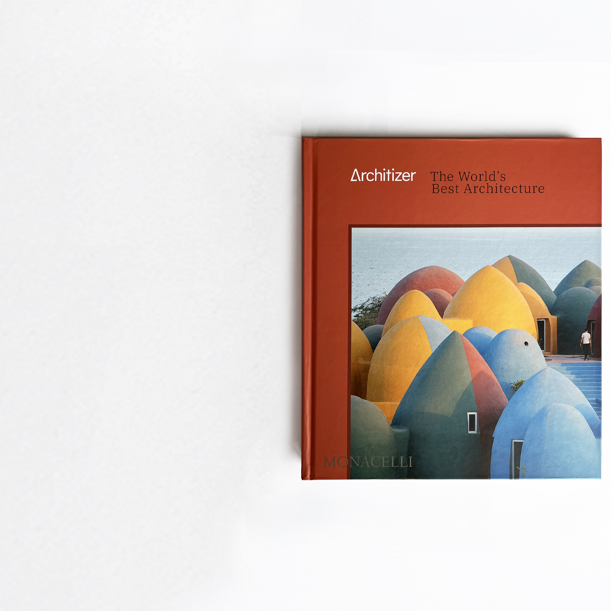 Photograph of the official Architizer: The World’s Best Architecture book cover, displaying the title and publisher Monacelli.