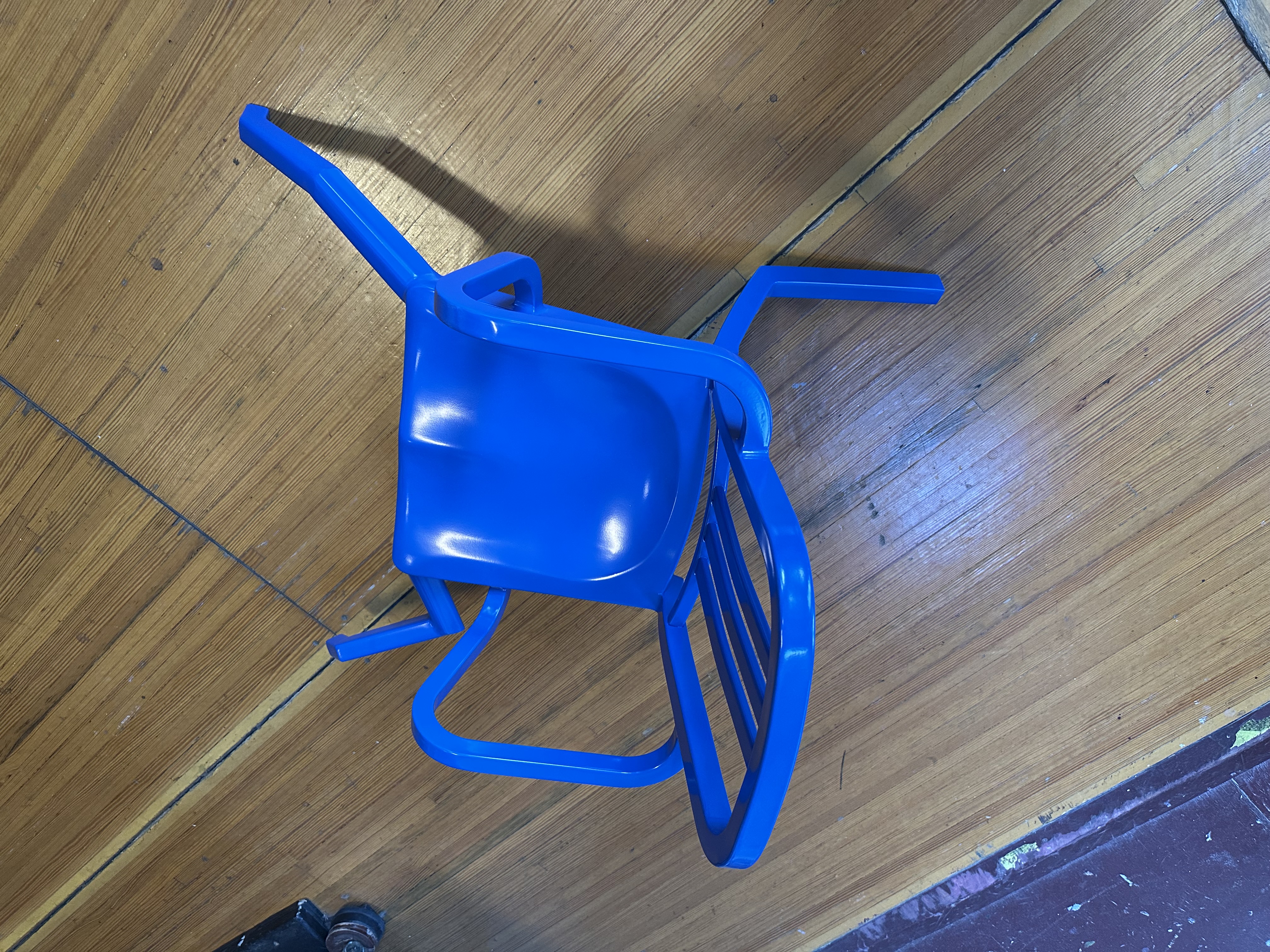 Aluminum and Paint sculpture titled 'Defenestration Climbing Chair' by Brian Goggin