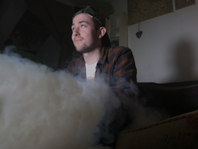 The idea for this commercial was to mock micro-transactions in video game, a concept that didn’t quite exist in the 90s but is very prevalent in some games today. Where unlocking levels and items are no longer earned but must be purchased instead. To replicate the style of an early 90s ad, I used various forms of practical effects.  A make-shift light manipulator; sort of like an umbrella with different coloured lighting gels, was spun continuously in front of the key light to motivate the light for a flickering tv. A fog machine was used for atmosphere, this was also paired with a leaf blower and torn pieces of paper to help motivate the energy emitting from the TV. It was a lot of fun using this in the actor’s – Charlie – face. 