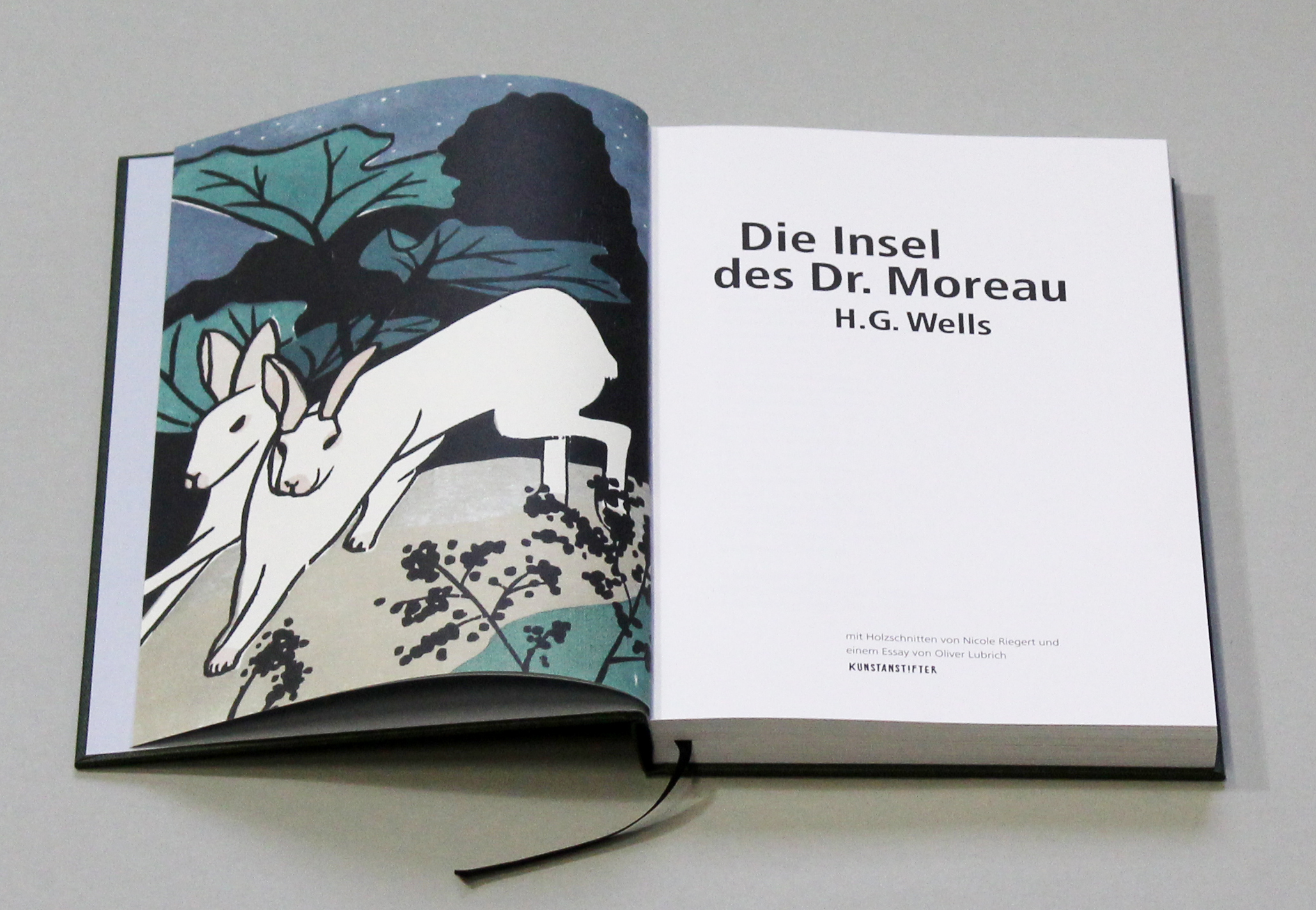 Buch Innentitel mit Holzschnittillustration zu »Die Insel der Dr. Moreau«
