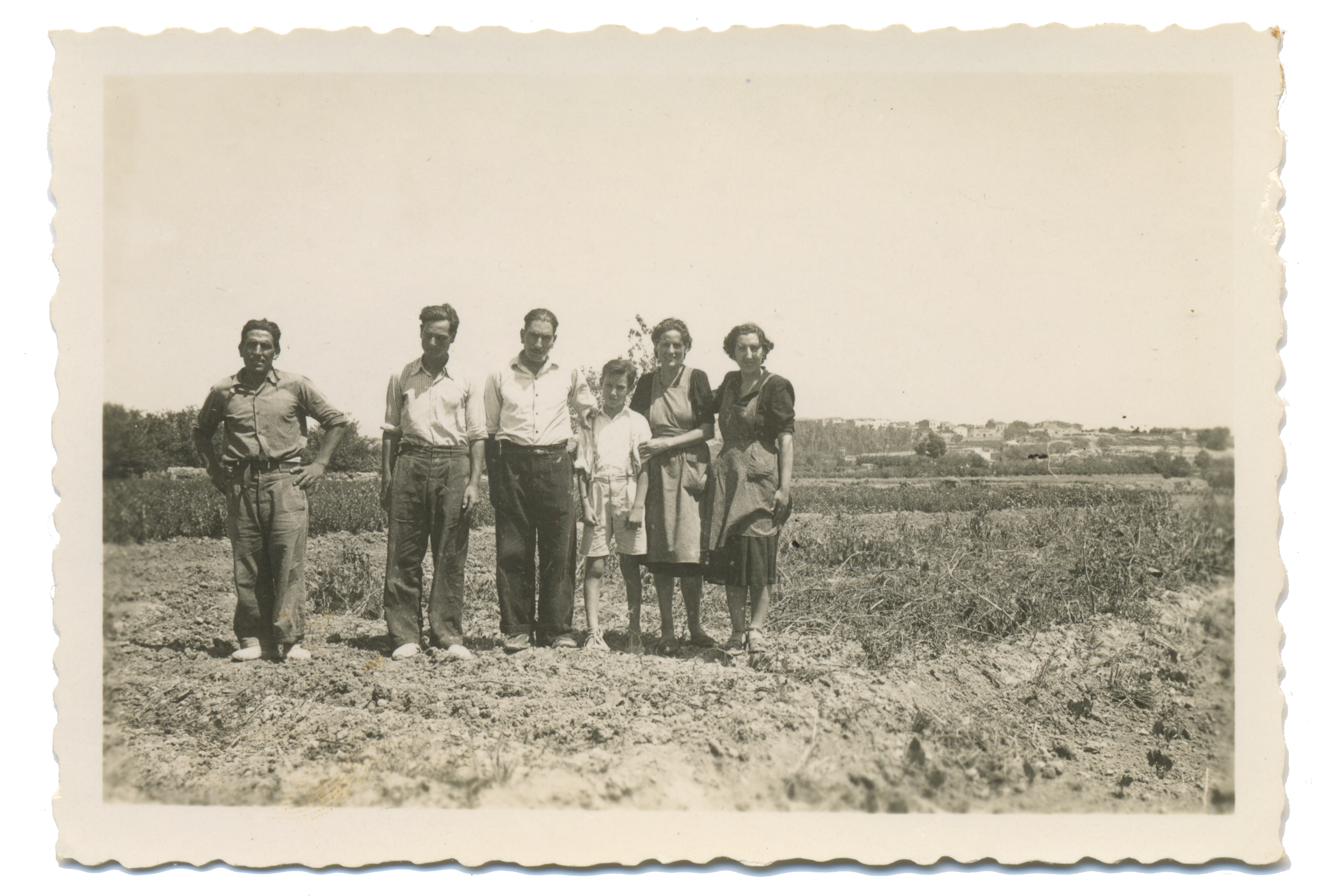 Circa 1947. My grandfather (boy in the middle) and his relatives in their family farmhouse in Puigpelat.
