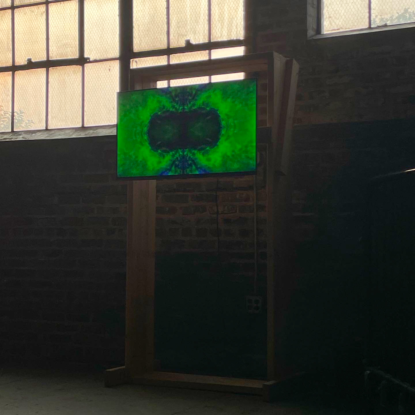 Monolith of Prophetic Visions (2023) : various dimensions : wooden structure with led television