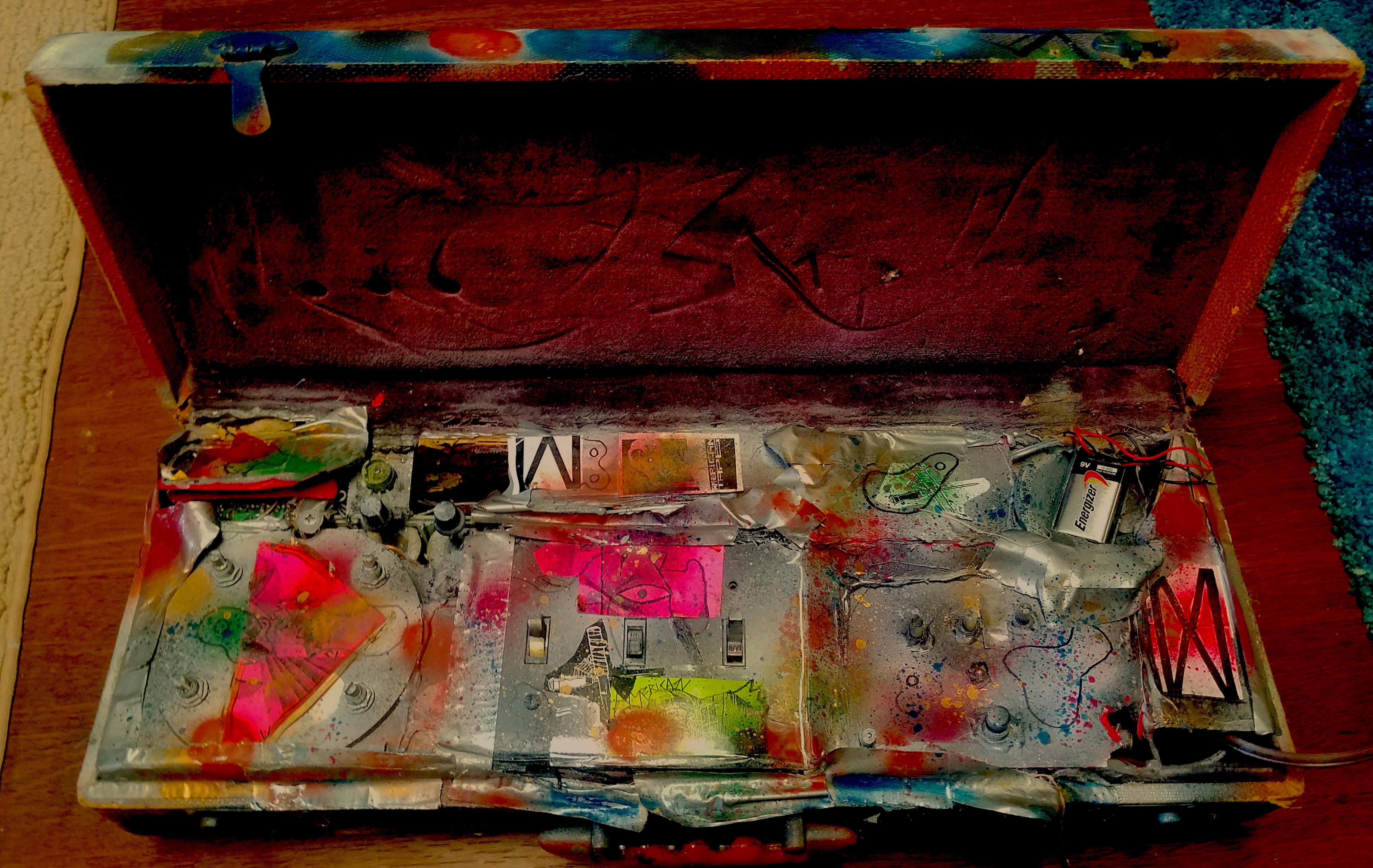 oldest instrument owned, still plays great. Old cracked boom box with added cracked rat pedal. First played NYC Columbia radio with this 1996, a precursor to the suitcase approach. 