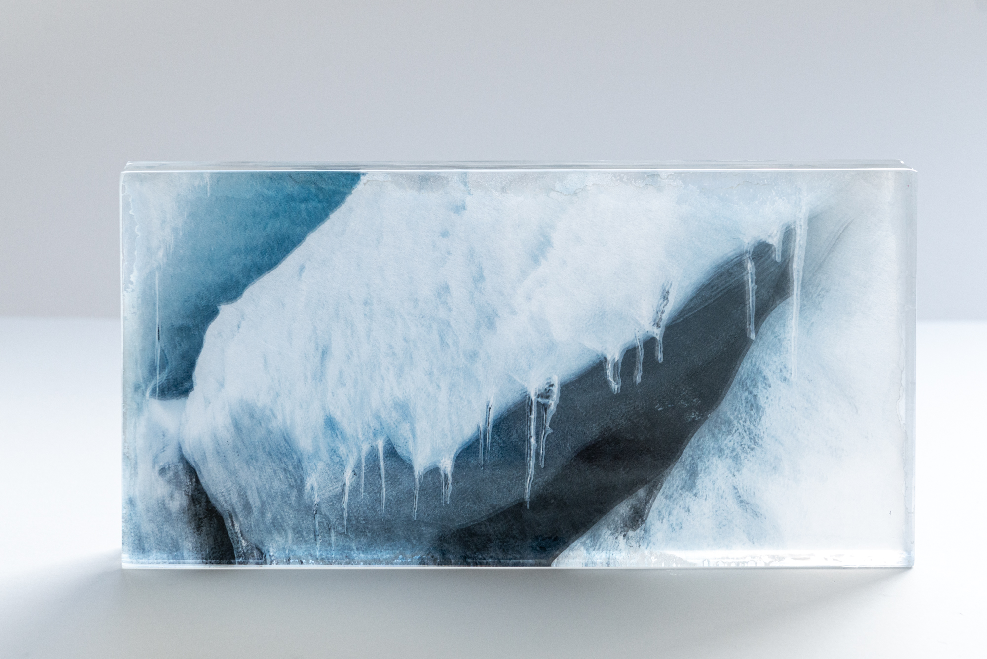GLACIER #3 | 2024 | UNIQUE PIECE | Layered sculpture, consisting of printed transparents & 10gs washi paper, cast with resin | 21 X 42 X 5 CM