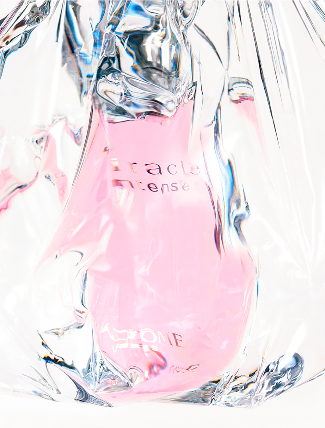 Conceptually shot Lancome "Miracle" fragrance bottle artistically captured by Still Life Photographer Isabelle Bonjean