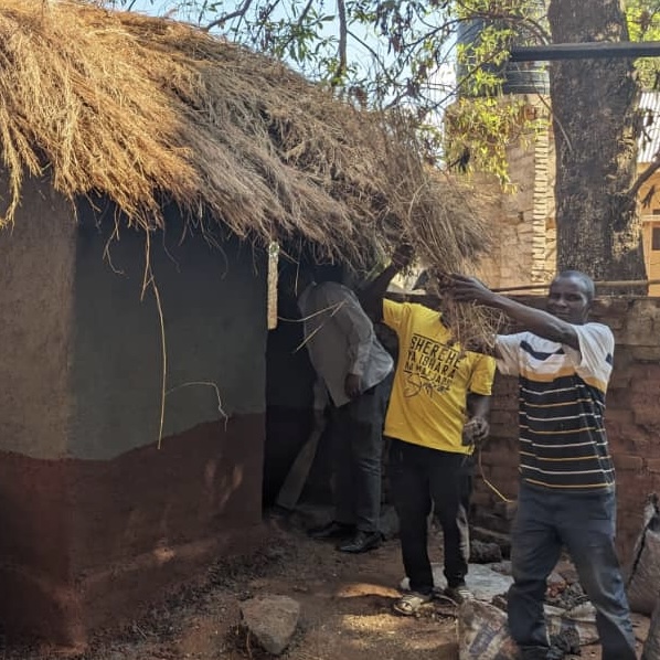 Members of the Maji Maji study group busy with a facilities restoration excercise.