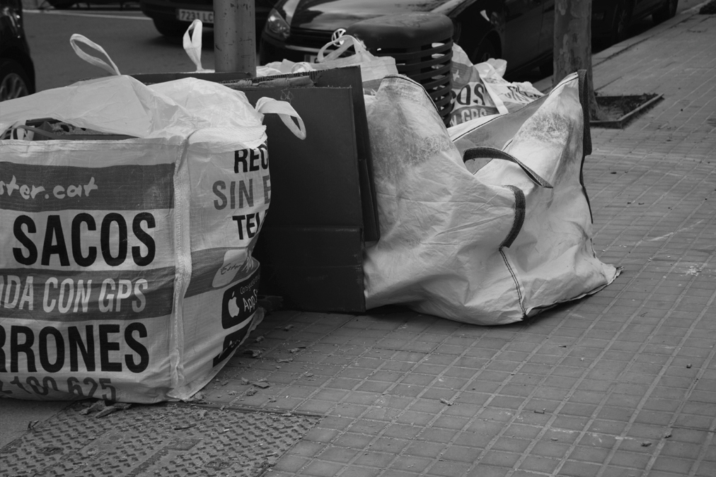 Construction materials and flattened boxes, Sant Martí District, Barcelona ES.