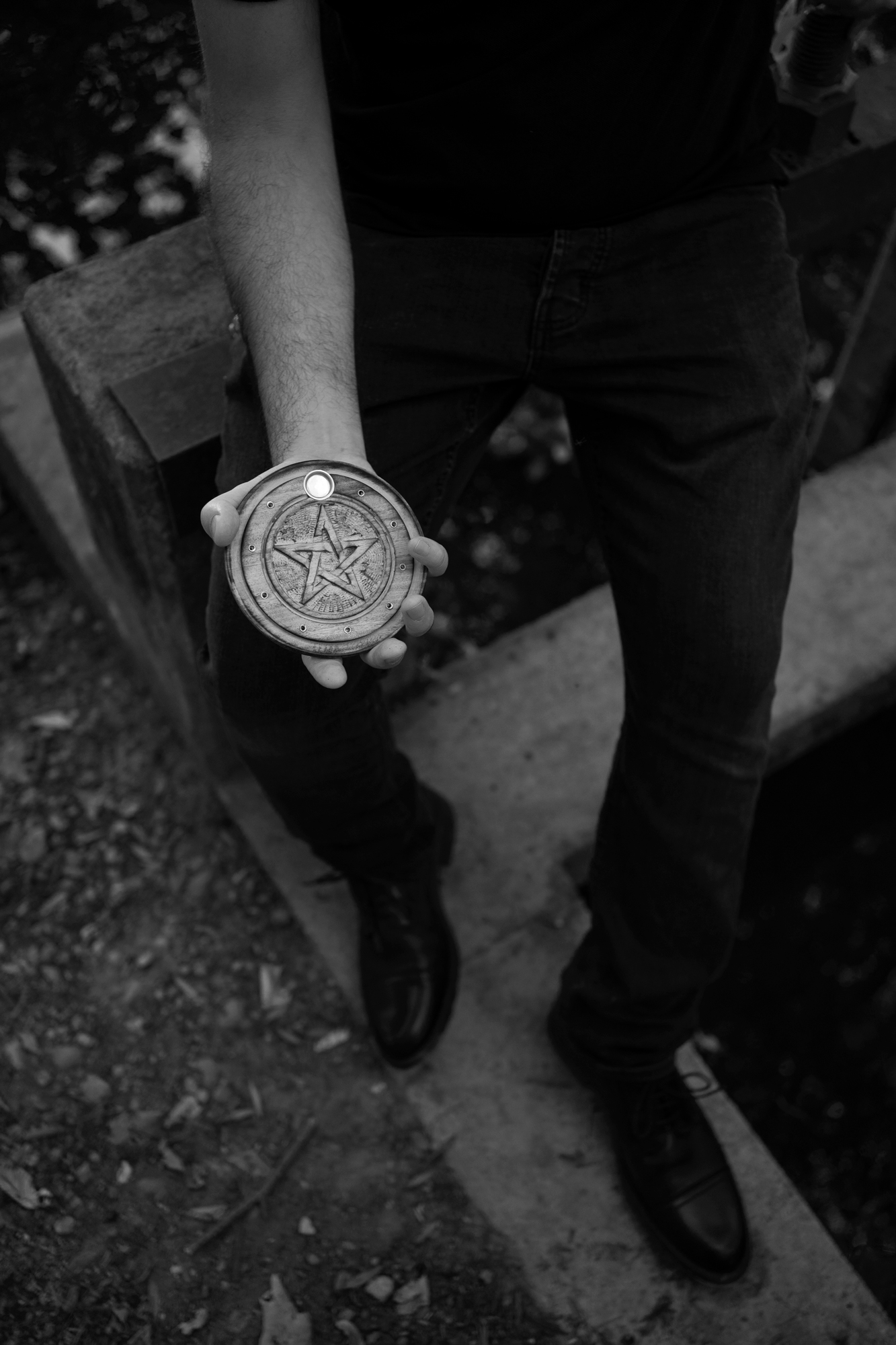 Alessandro with one of his amulets, Milan, July 2022.
