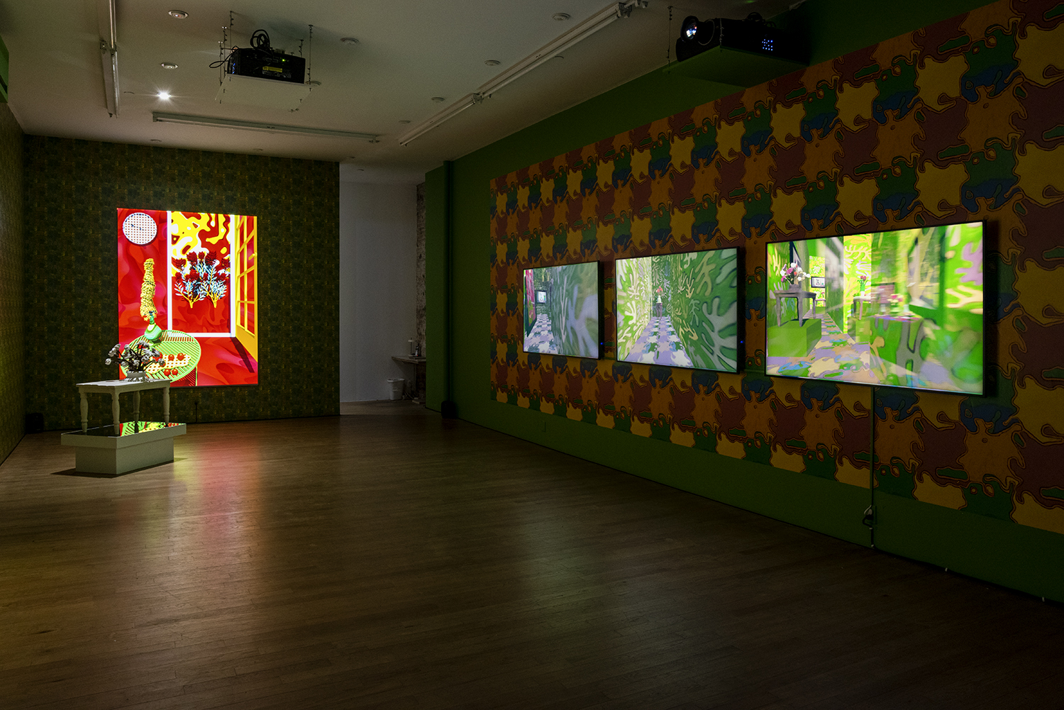 The Ruins, September 10–October 25, 2020 at bitforms gallery in NY, from left to right: The Still Life With Flowers by Henri Fantin-Latour, 2019, 3D-printed resin, pigmented silicone, walnut, basswood, and maple, custom pine and Plexiglass pedestal, 34 x 29.5 x 19 in / 86.4 x 74.9 x 48.3 cm, sculpture, 48 x 36.5 x 24.5 in / 121.9 x 92.7 x 62.2 cm, overall with bases; The Green Table, 2020, Video animation (color, silent), projector, stretched screen, media player, 90 x 66.5 x 1.5 in / 228.6 x 168.9 x 3.8 cm, 5 min, video loop, Joyful Noise, 2020, Custom augmented-reality wallpaper, custom augmented-reality software application, tablet, dimensions variable; The Ruins, 2020. Three-channel video animation (color, sound), three screens or projectors, three media players, speakers, dimension variable 10 min, loop