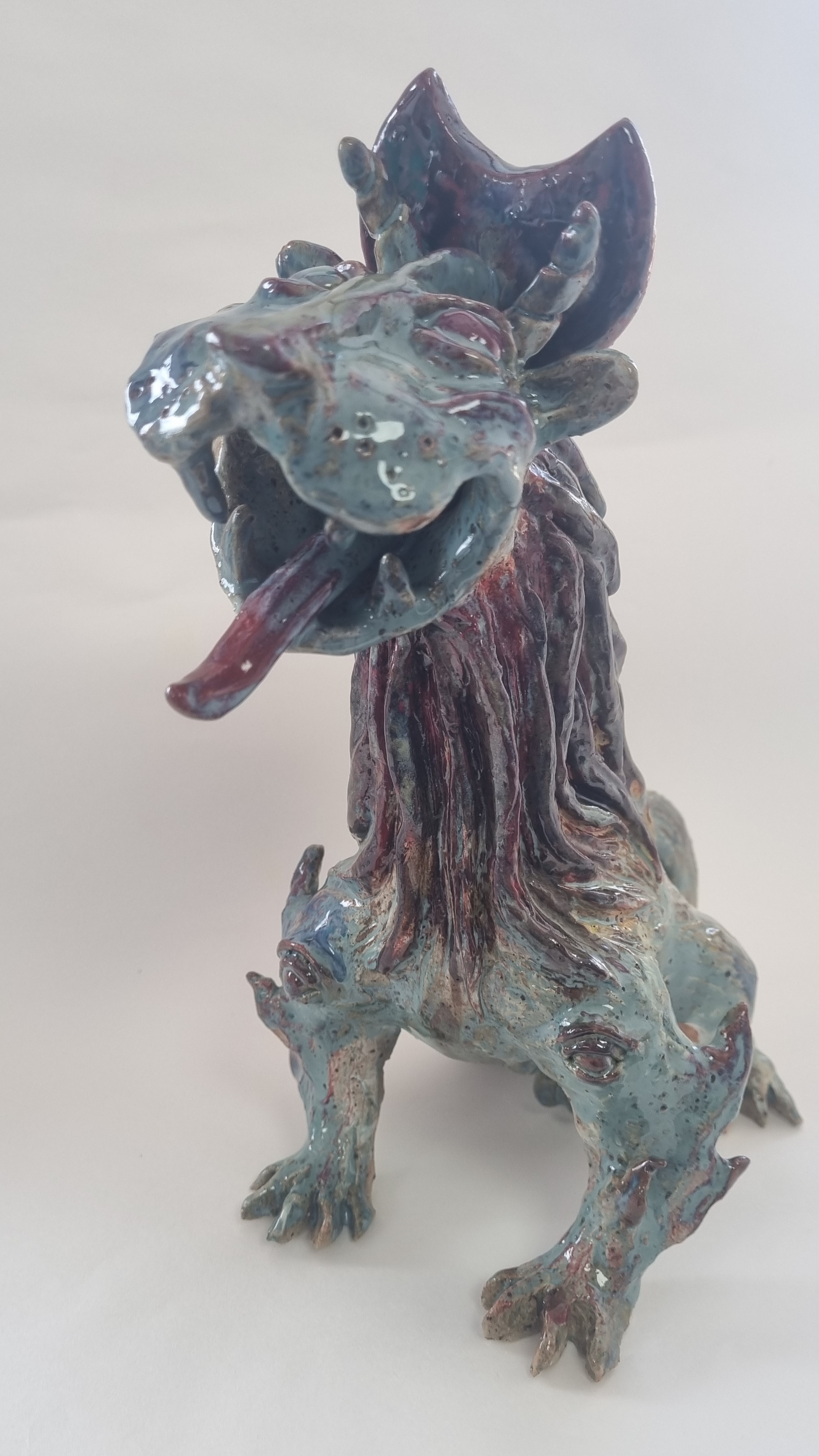 Dewa Singa Menguap (Yawning Lion Deity) 2023. Glazed earthenware. 27 x 13 x 19 cm. $570