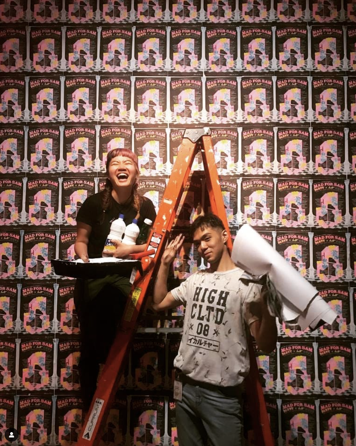 Kathy and I building the wheatpaste wall